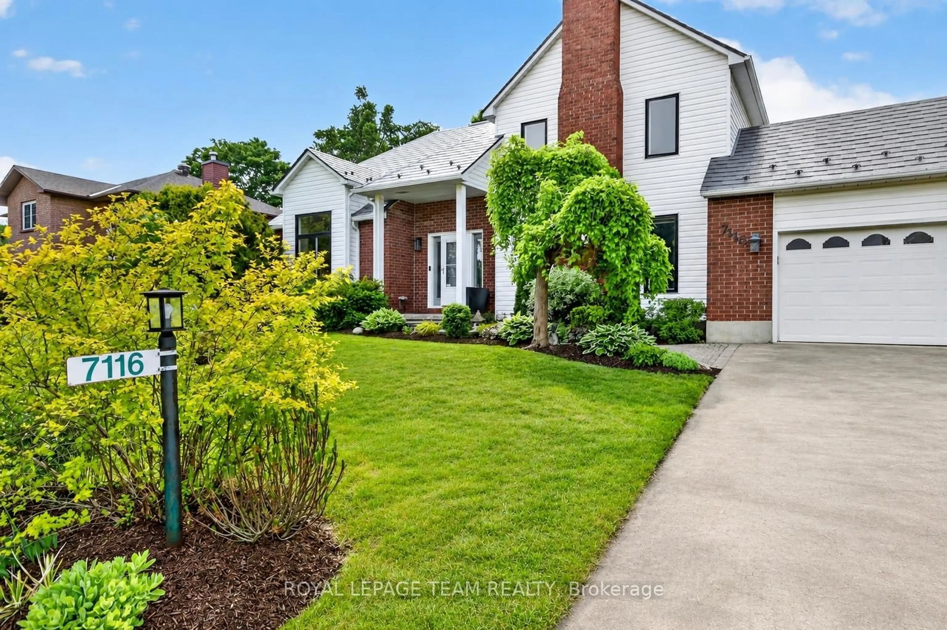 Home with brick exterior material, street for 7116 QUINNFIELD Way, Greely Ontario K4P 1B6