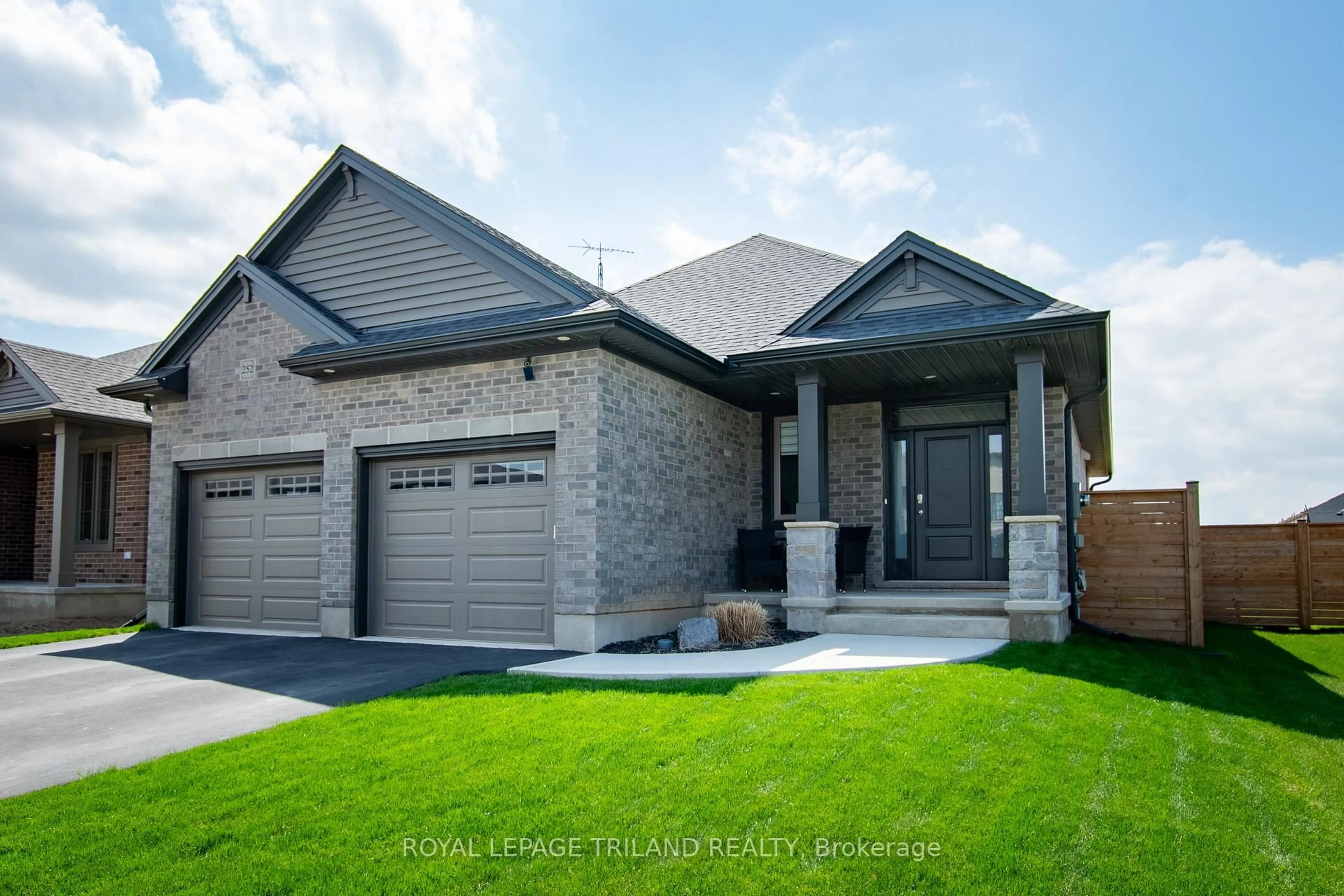 Home with brick exterior material, street for 252 Renaissance Dr, St. Thomas Ontario N5R 0P9