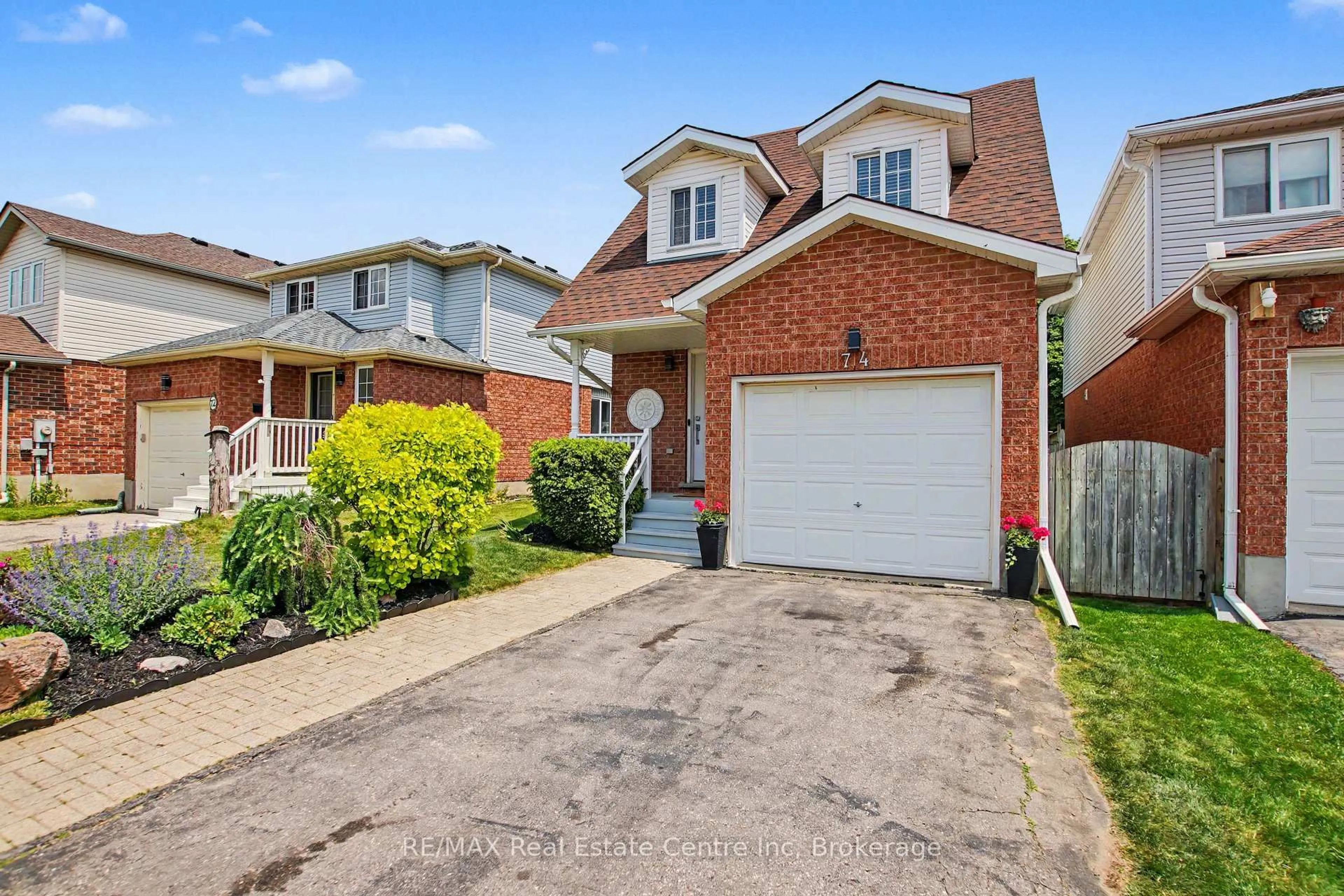 Home with brick exterior material, street for 74 Activa Ave, Kitchener Ontario N2E 3R4