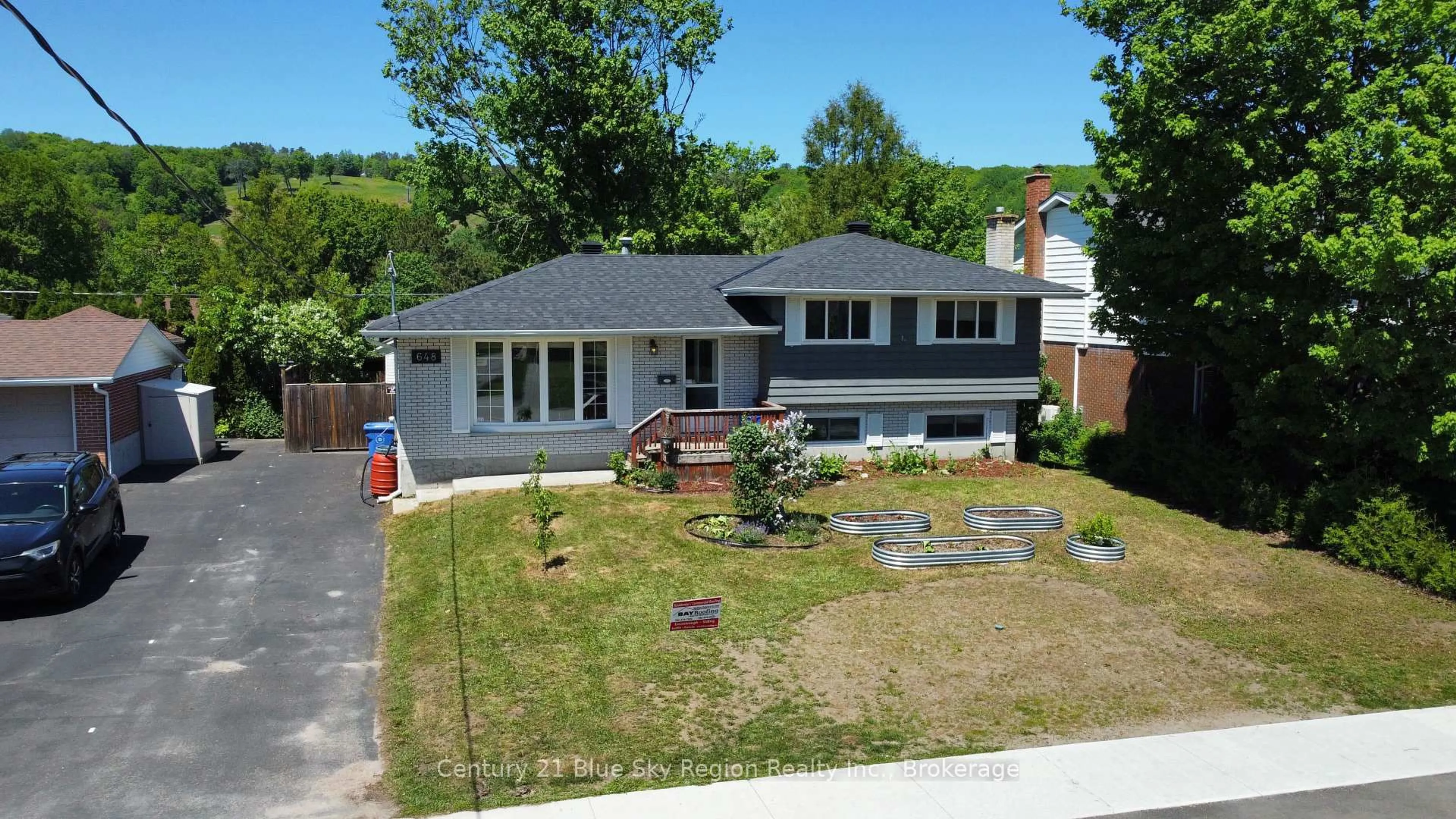 A pic from outside/outdoor area/front of a property/back of a property/a pic from drone, street for 648 Norman Ave, North Bay Ontario P1B 8B9