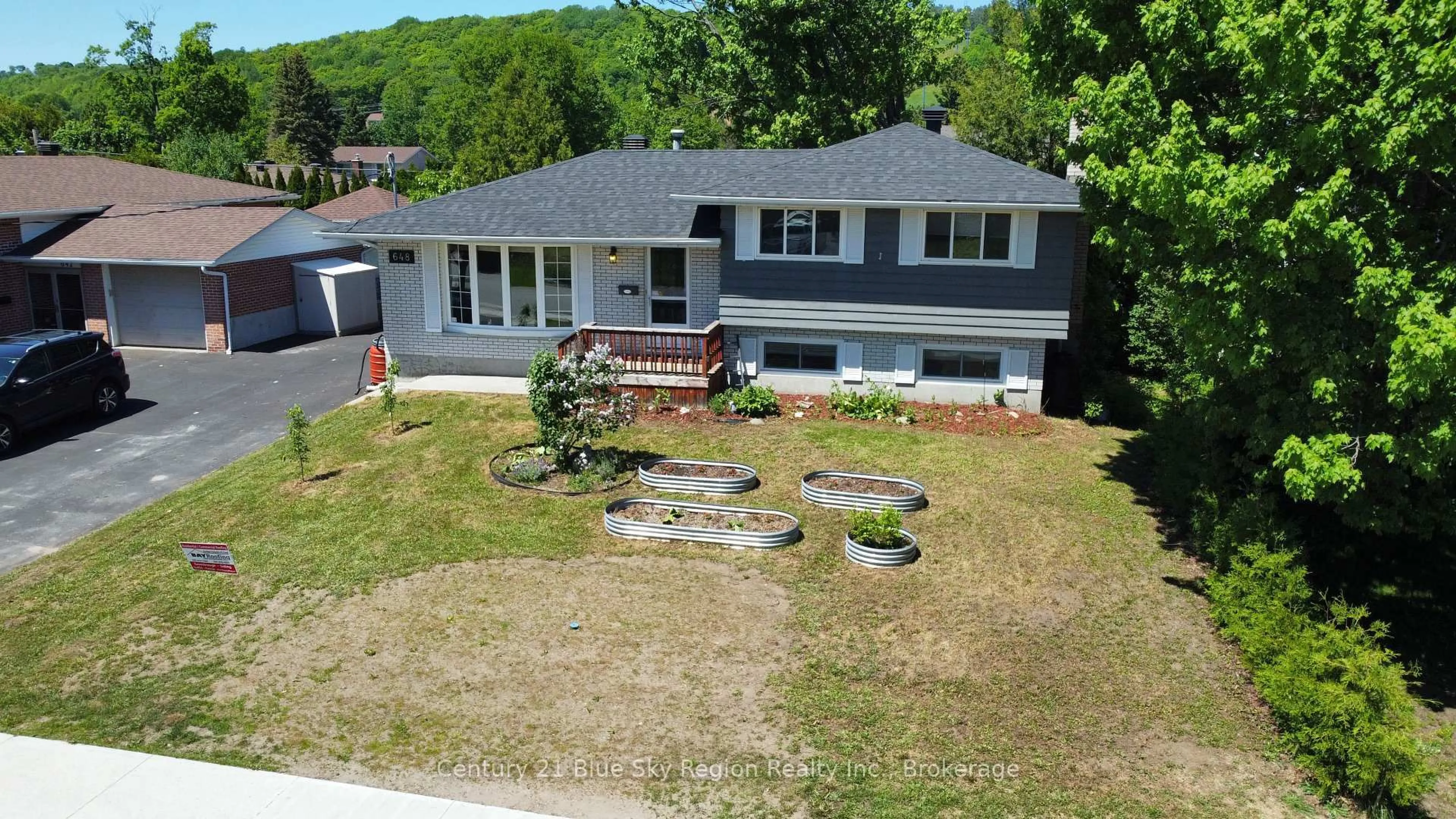 A pic from outside/outdoor area/front of a property/back of a property/a pic from drone, street for 648 Norman Ave, North Bay Ontario P1B 8B9