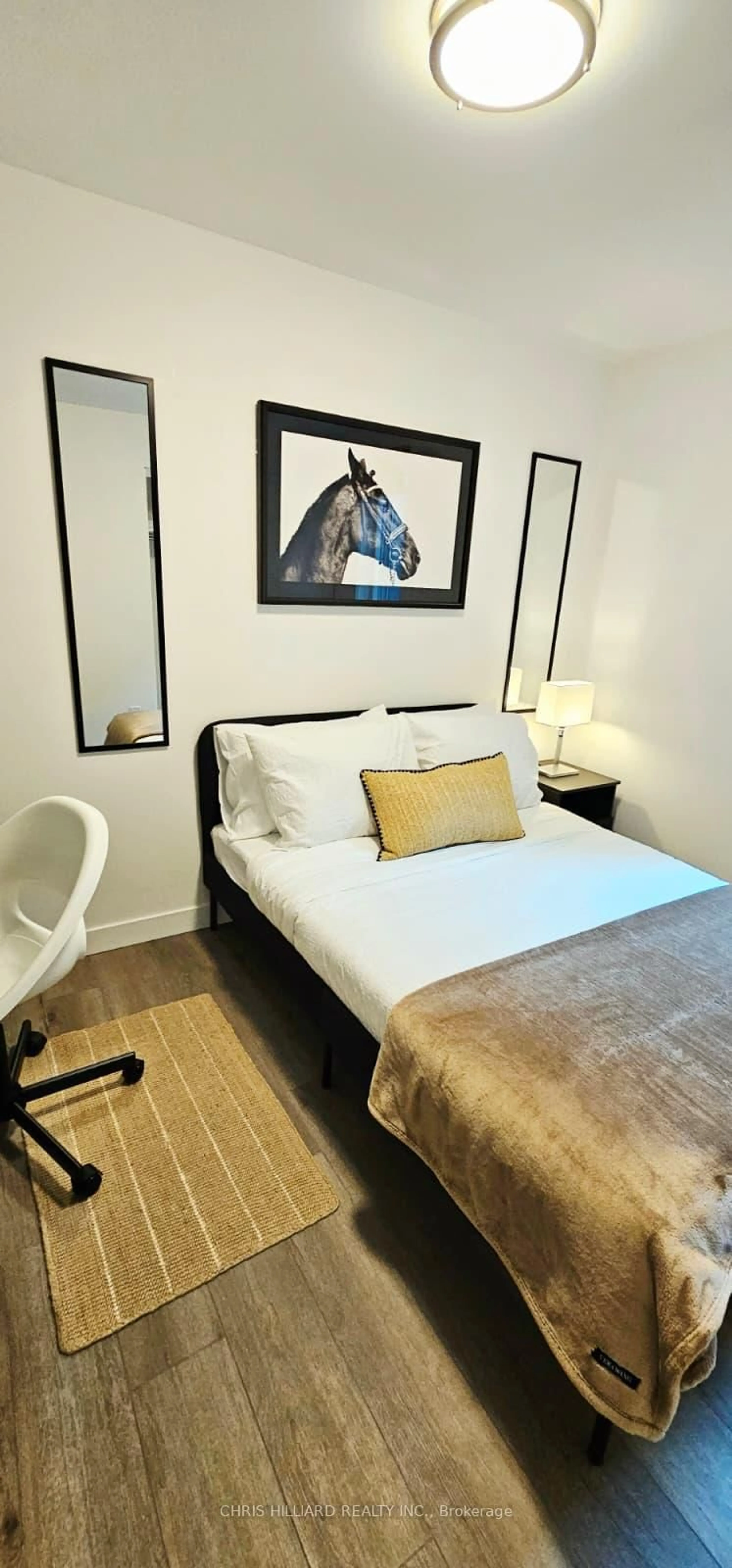 Bedroom with bed, wood/laminate floor for 216 Mcarthur Ave, Ottawa Ontario K1L 6P5