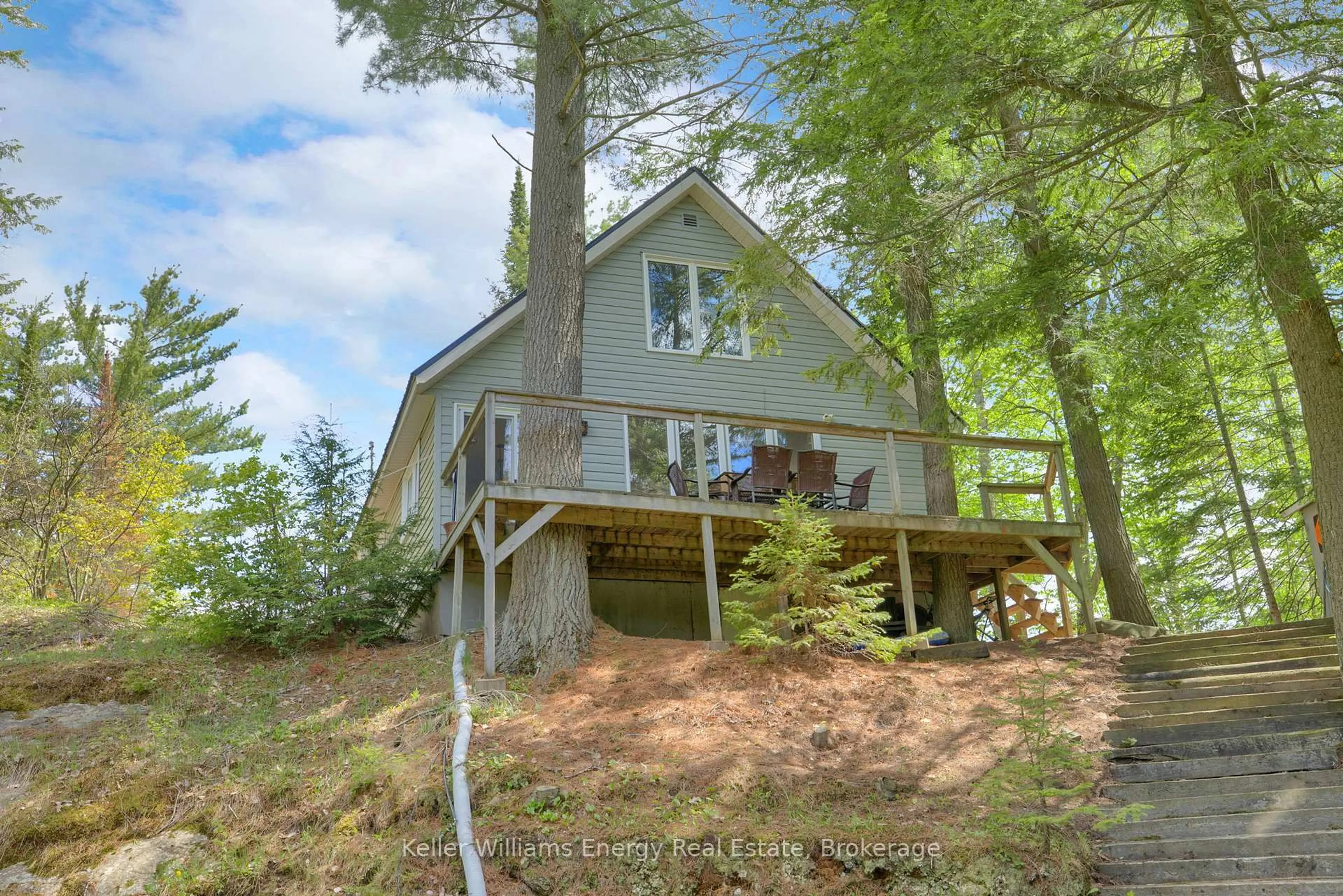A pic from outside/outdoor area/front of a property/back of a property/a pic from drone, water/lake/river/ocean view for 34C Bentley Lake Pl, Bancroft Ontario K0L 1C0