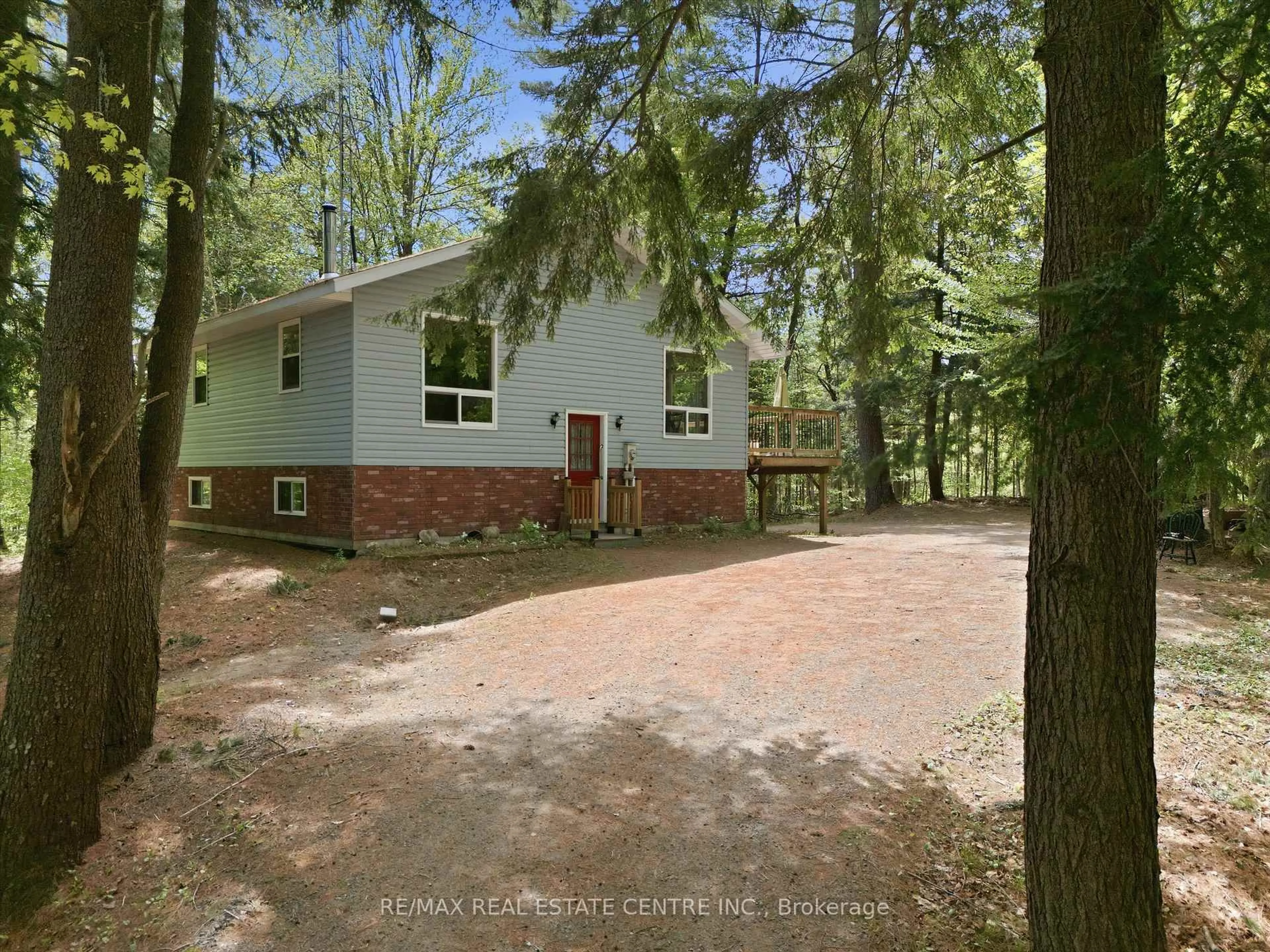 A pic from outside/outdoor area/front of a property/back of a property/a pic from drone, forest/trees view for 1059 Britannia Rd, Huntsville Ontario P1H 2J3