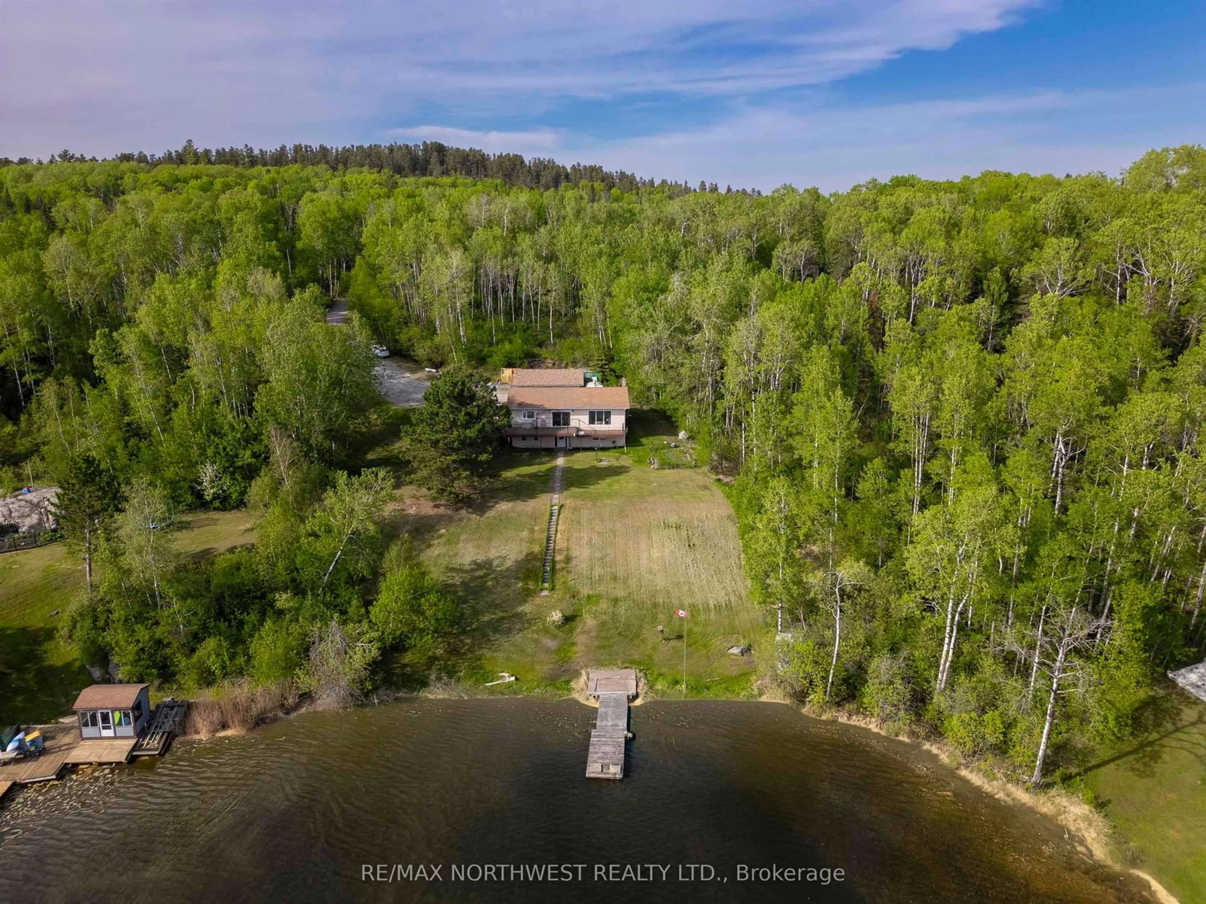 A pic from outside/outdoor area/front of a property/back of a property/a pic from drone, water/lake/river/ocean view for 2352 Coker Road, Kenora Ontario P9N 4N3