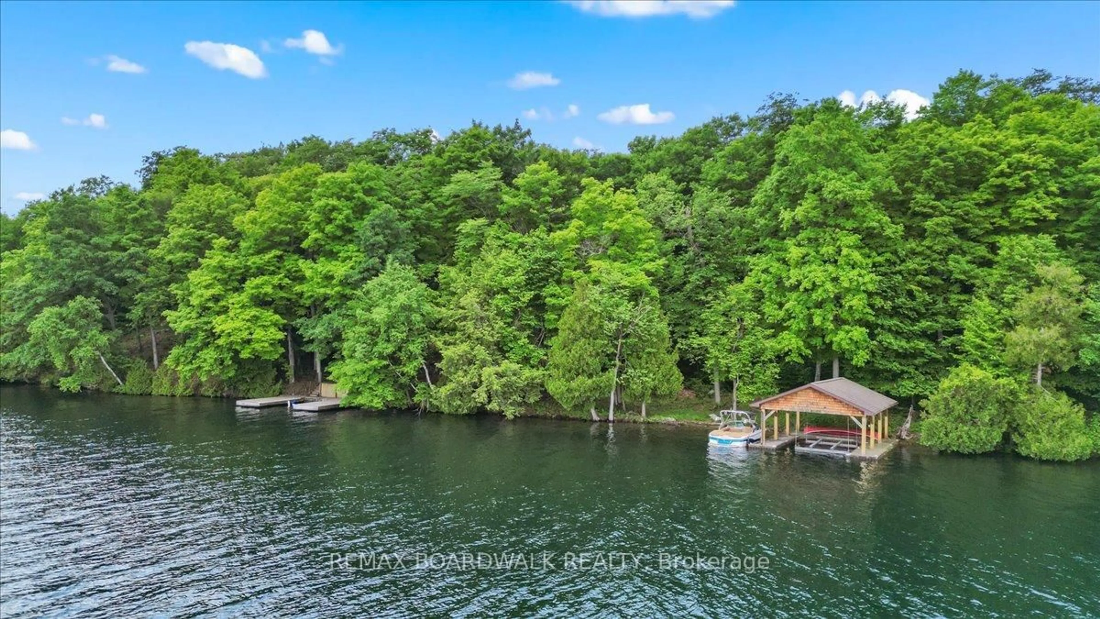 A pic from outside/outdoor area/front of a property/back of a property/a pic from drone, water/lake/river/ocean view for 6296 Big Island, Rideau Lakes Ontario K0G 1V0