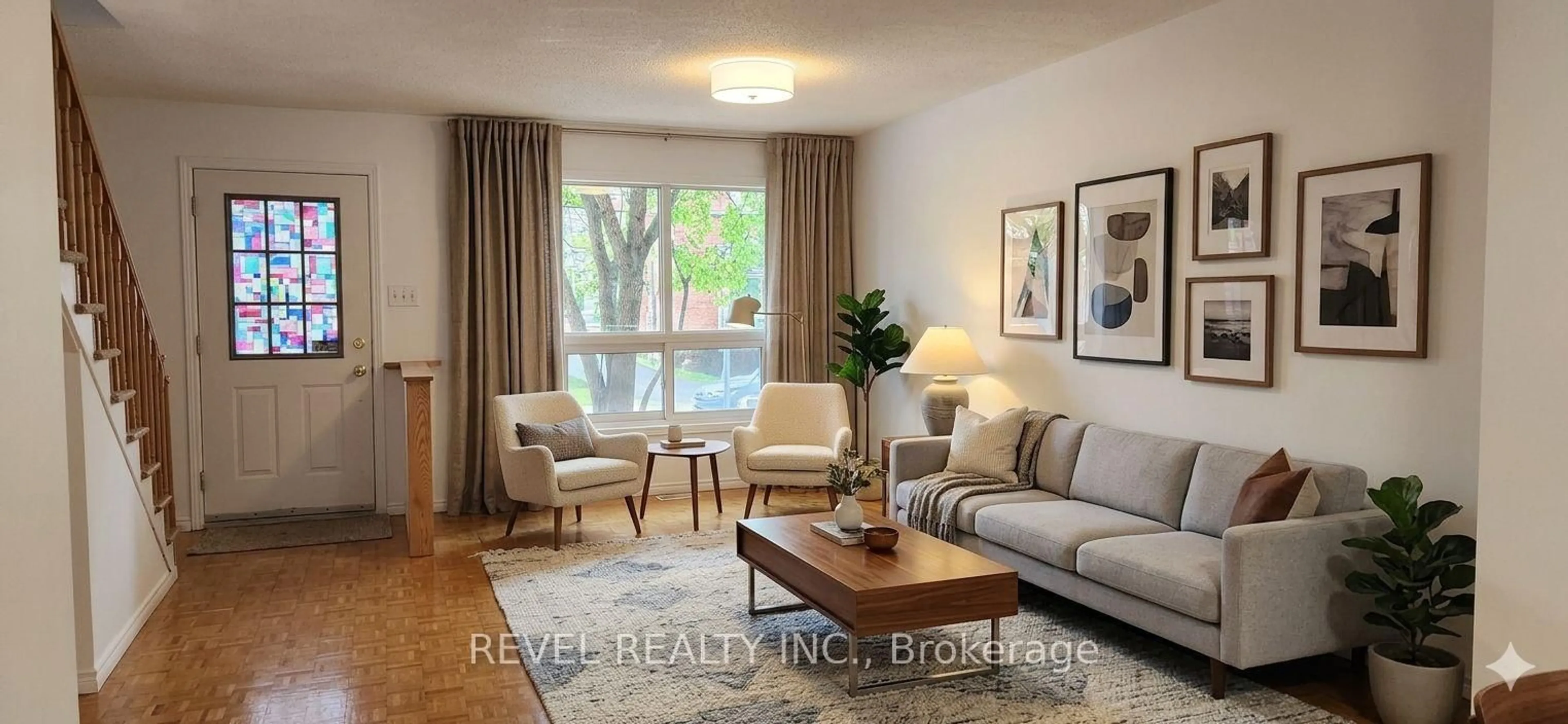 Living room with furniture, wood/laminate floor for 469 Parkdale Ave, Ottawa Ontario K1Y 1H5