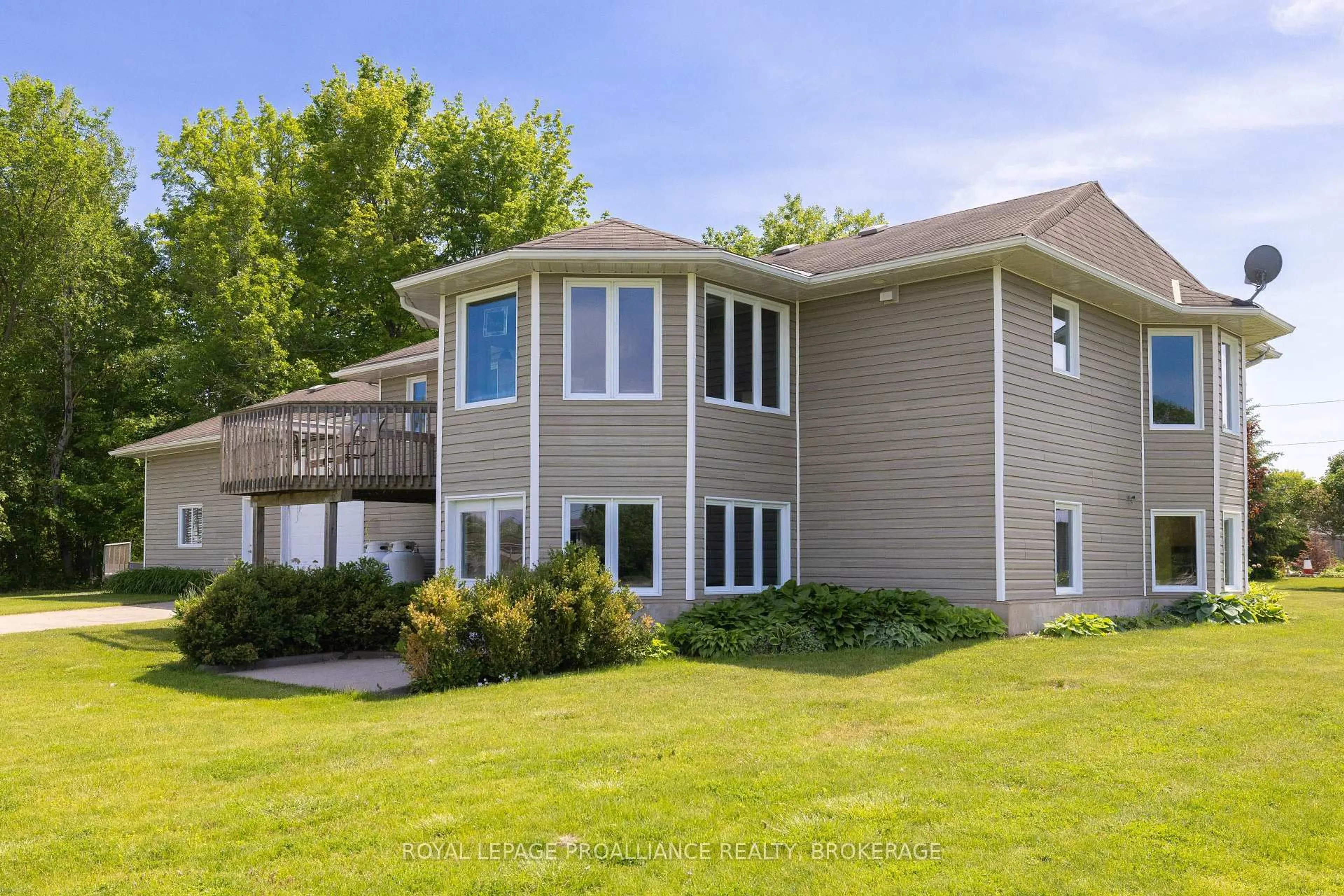 Home with vinyl exterior material, water/lake/river/ocean view for 2318 15 Highway, Kingston Ontario K7L 4V3