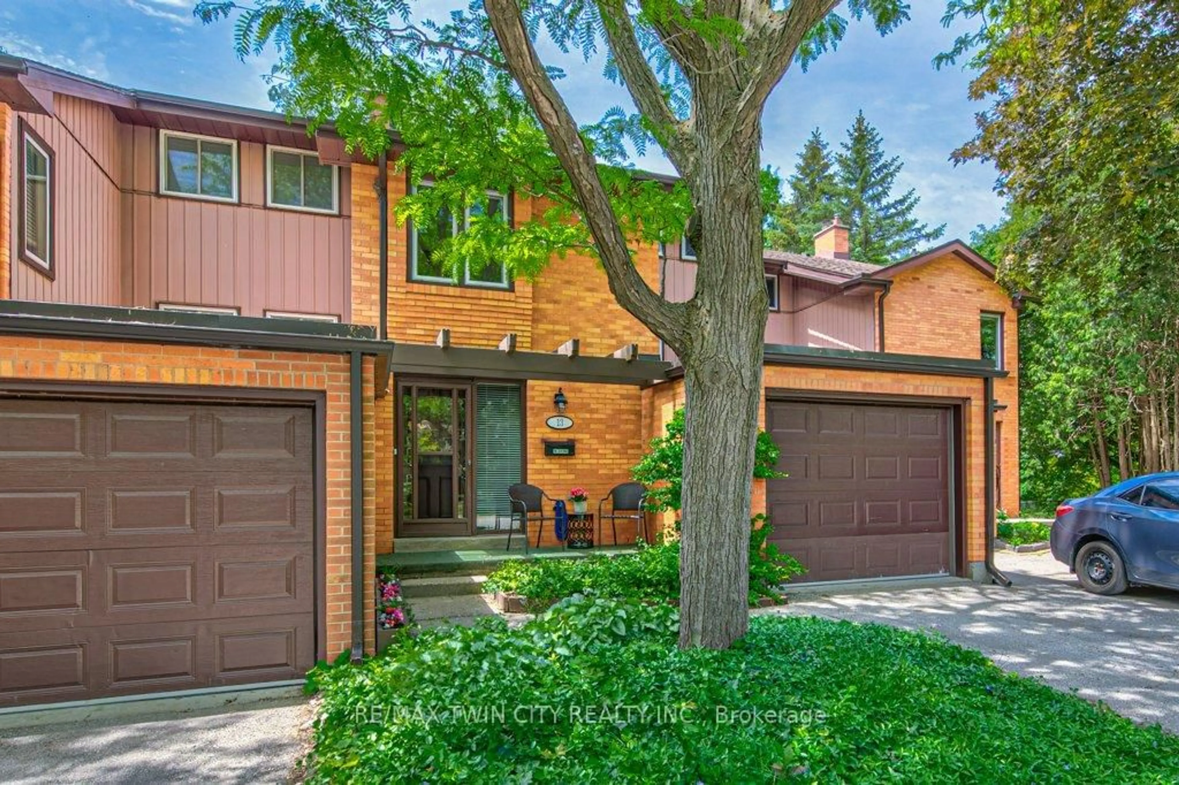 Home with brick exterior material, street for 206 Candlewood Cres #13, Waterloo Ontario N2L 5Y9