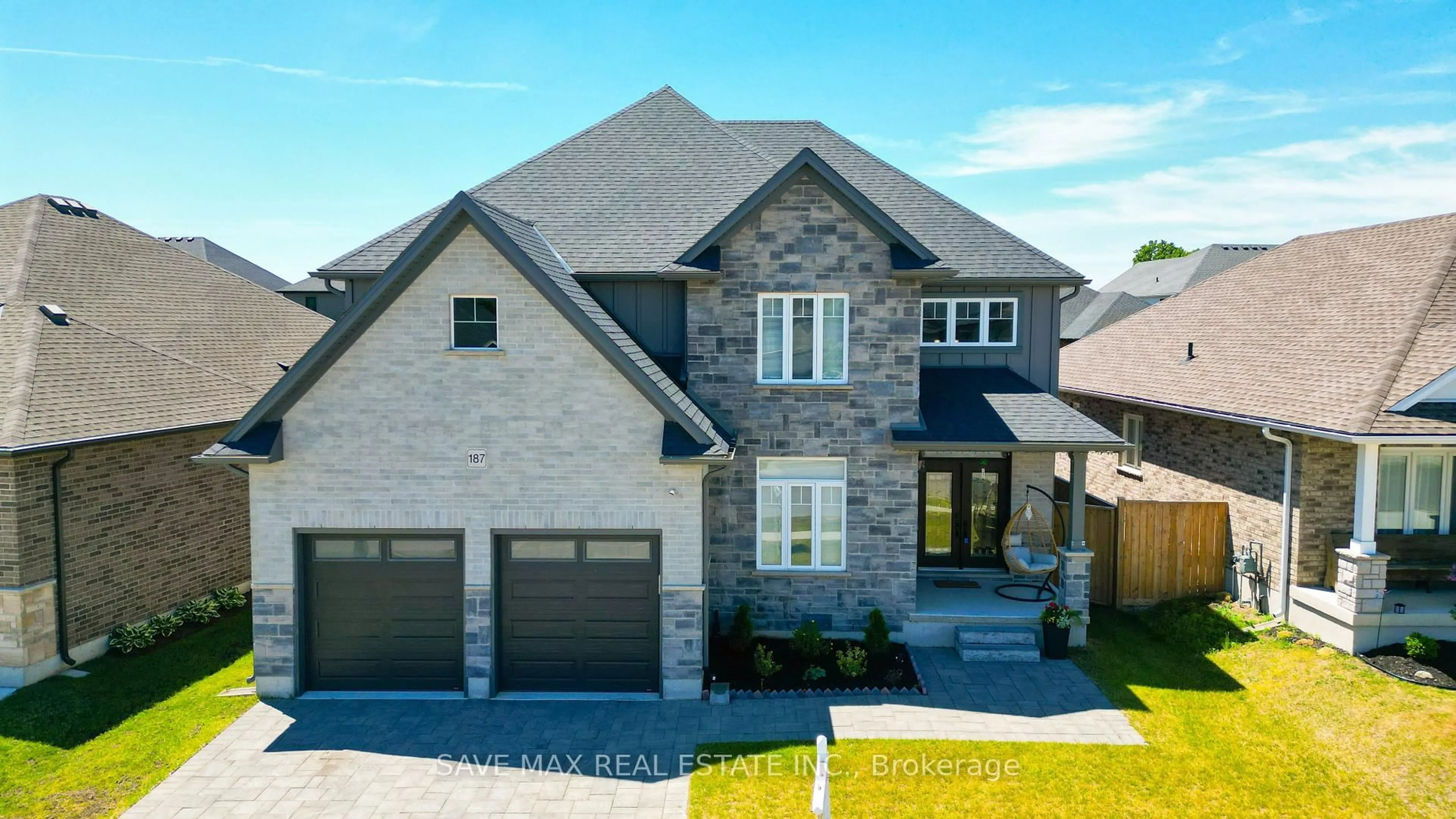 Home with brick exterior material, street for 187 Boardwalk Way, Thames Centre Ontario N0L 1G2
