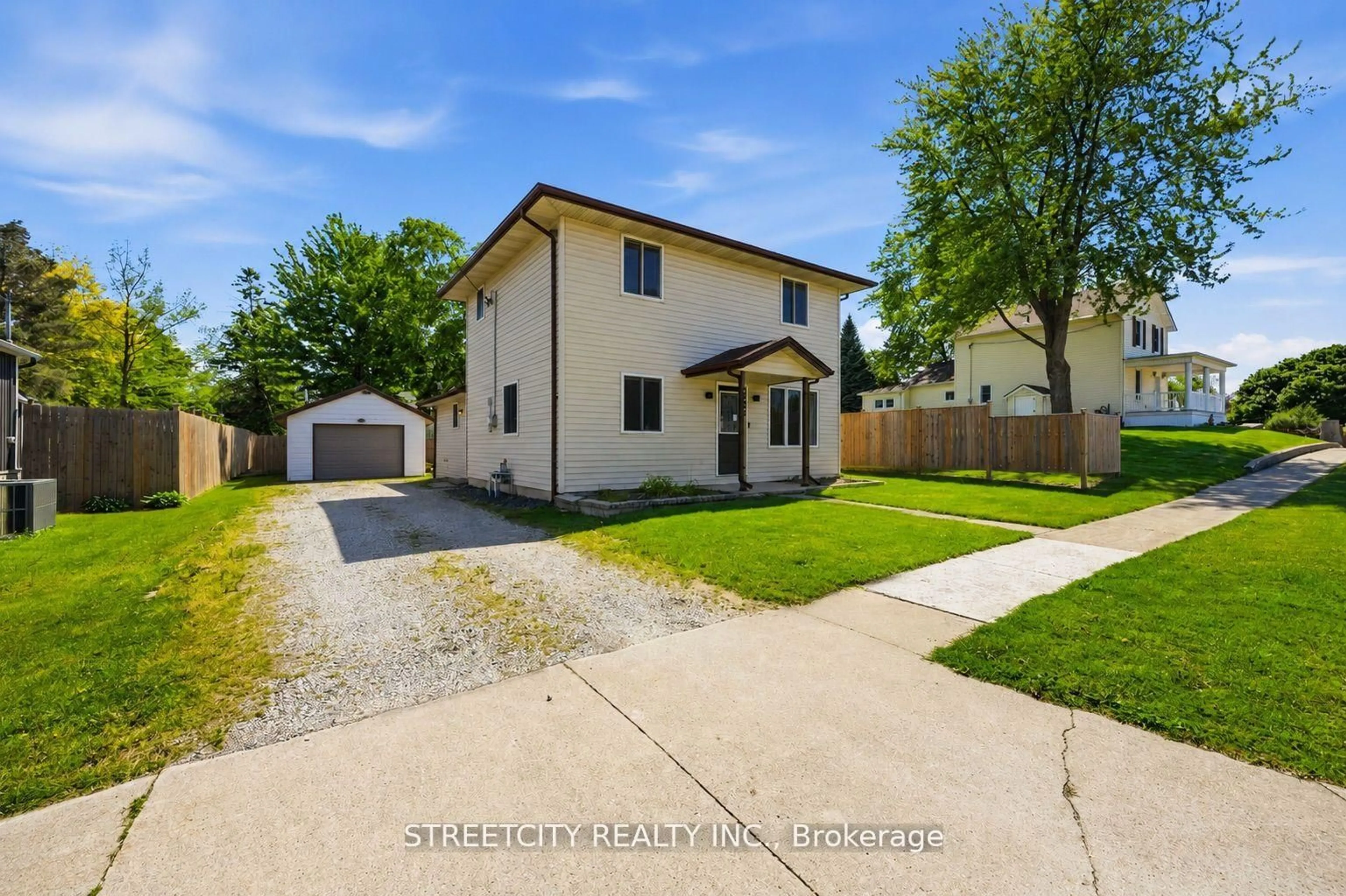 A pic from outside/outdoor area/front of a property/back of a property/a pic from drone, street for 502 Plympton St, Plympton-Wyoming Ontario N0N 1T0