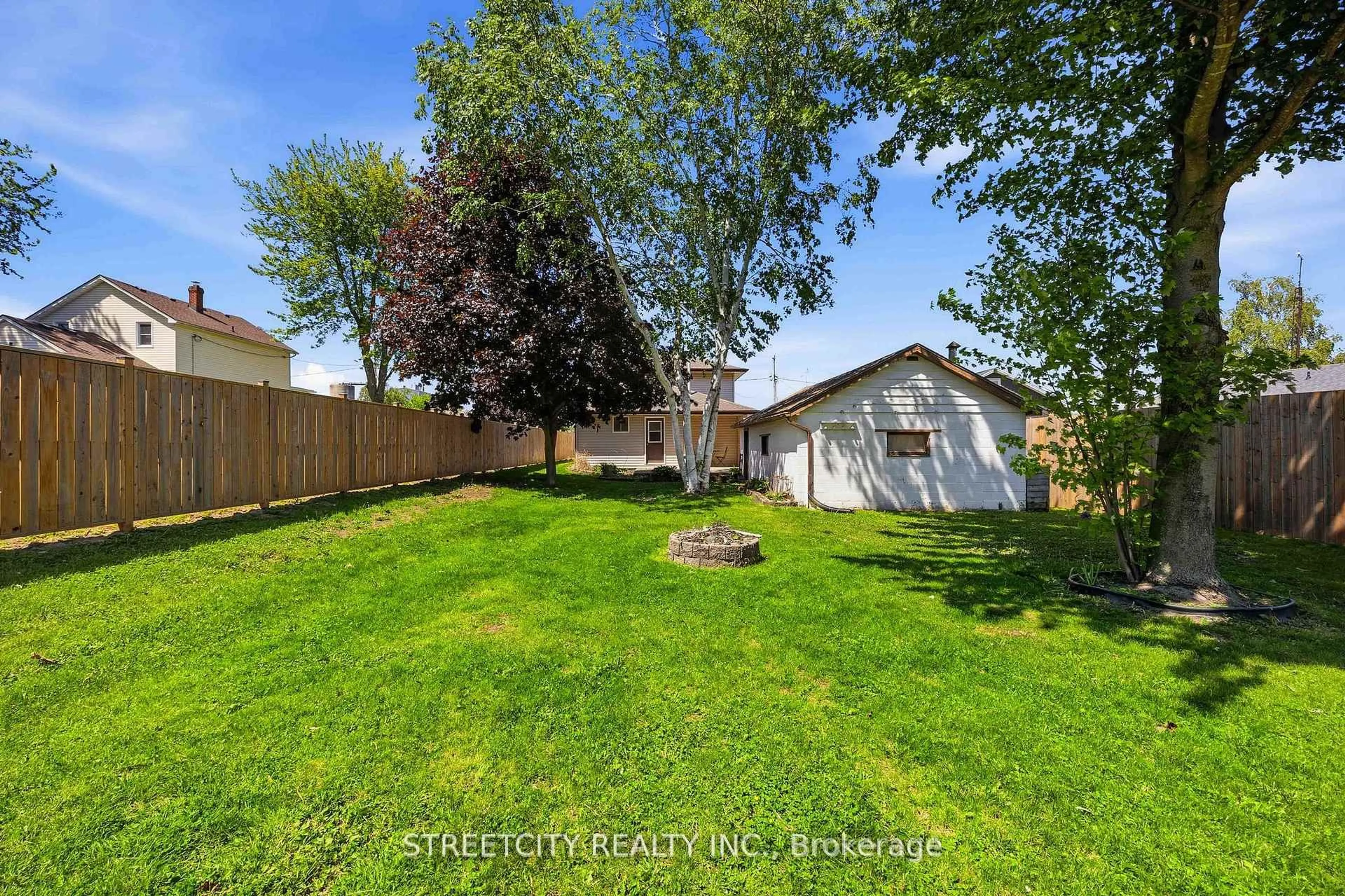 A pic from outside/outdoor area/front of a property/back of a property/a pic from drone, street for 502 Plympton St, Plympton-Wyoming Ontario N0N 1T0