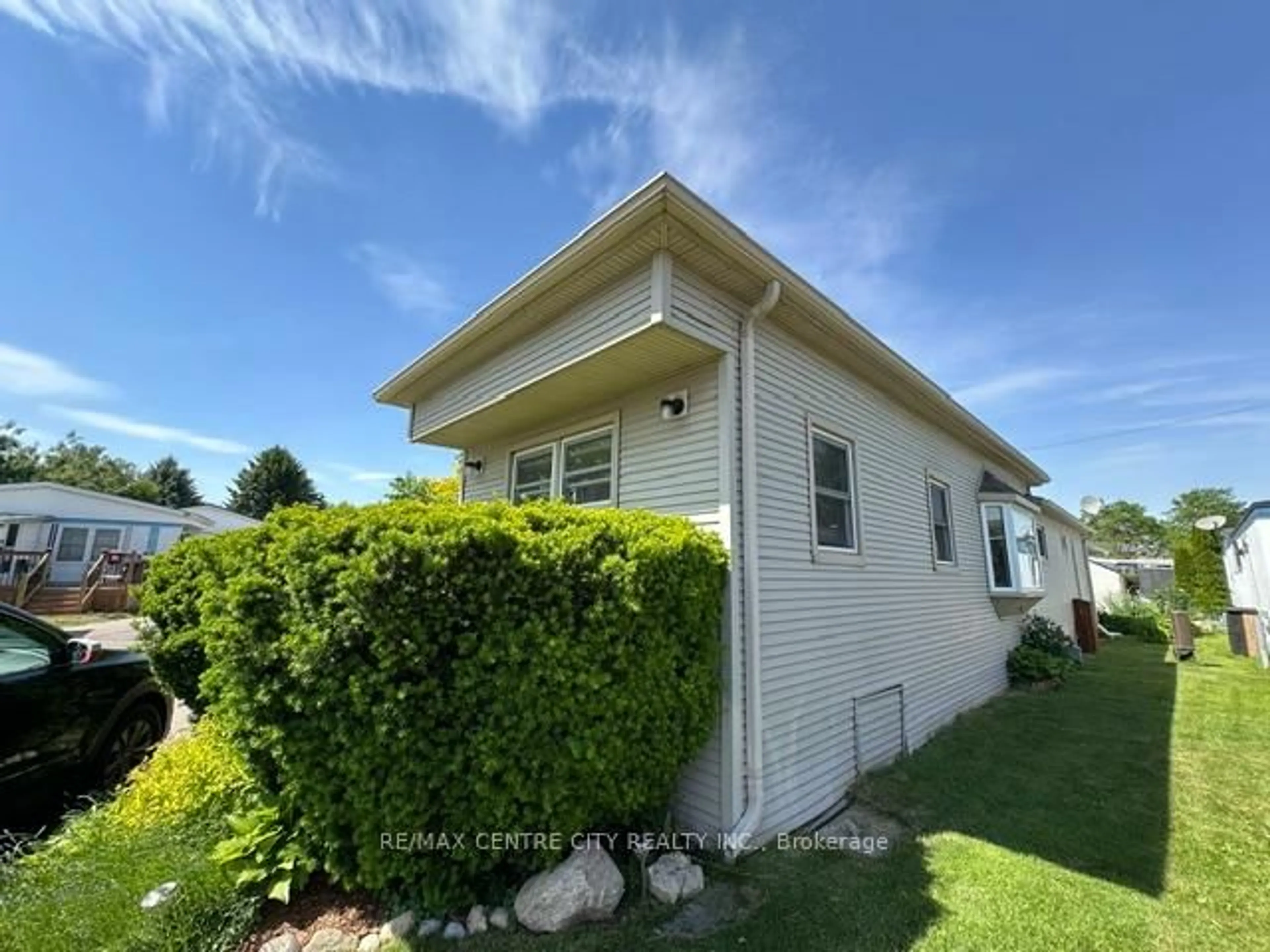 Home with vinyl exterior material, street for 2189 Dundas St #41, London East Ontario N5V 1H3