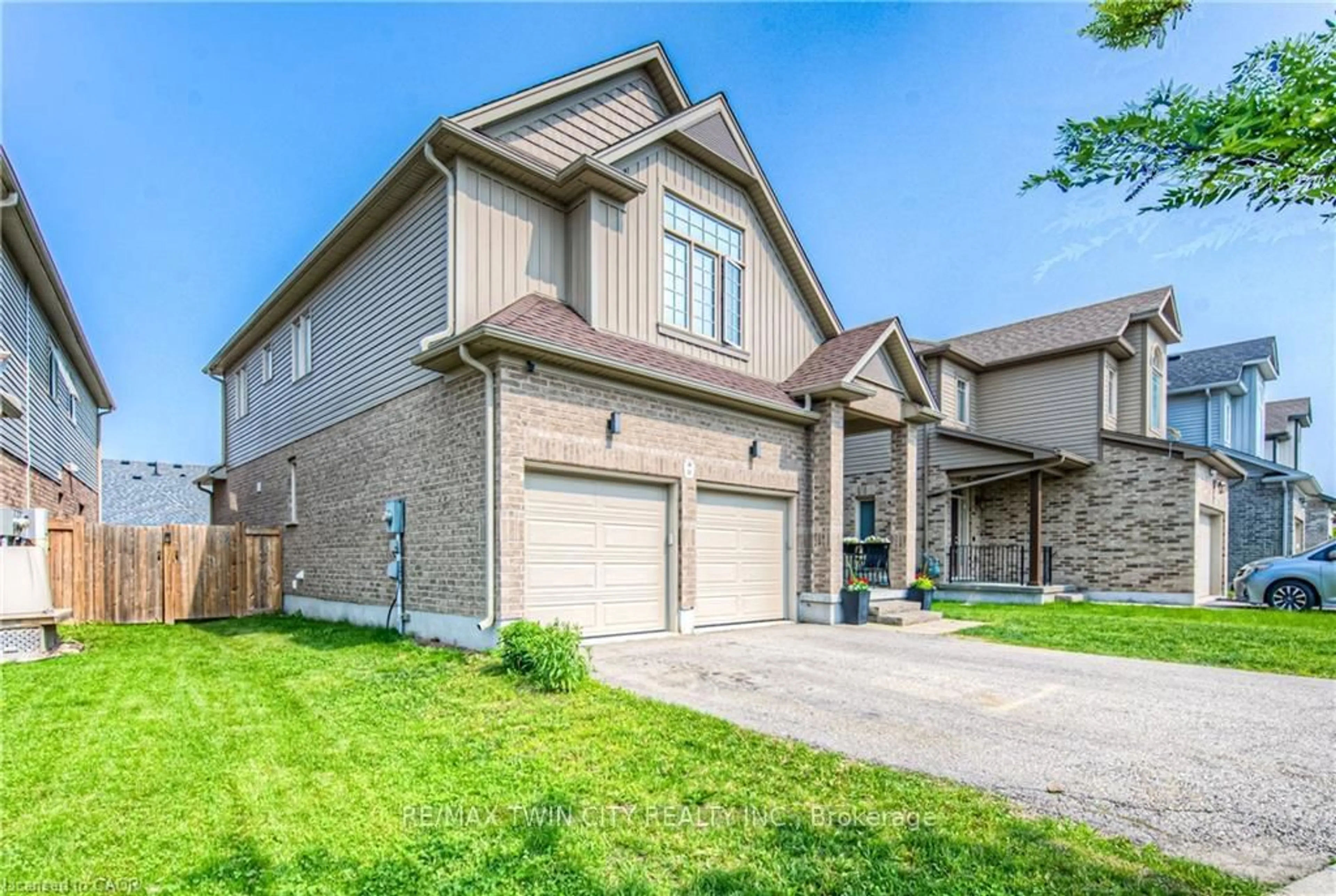 Home with brick exterior material, street for 26 SPRING CREEK St, Kitchener Ontario N2A 0G3