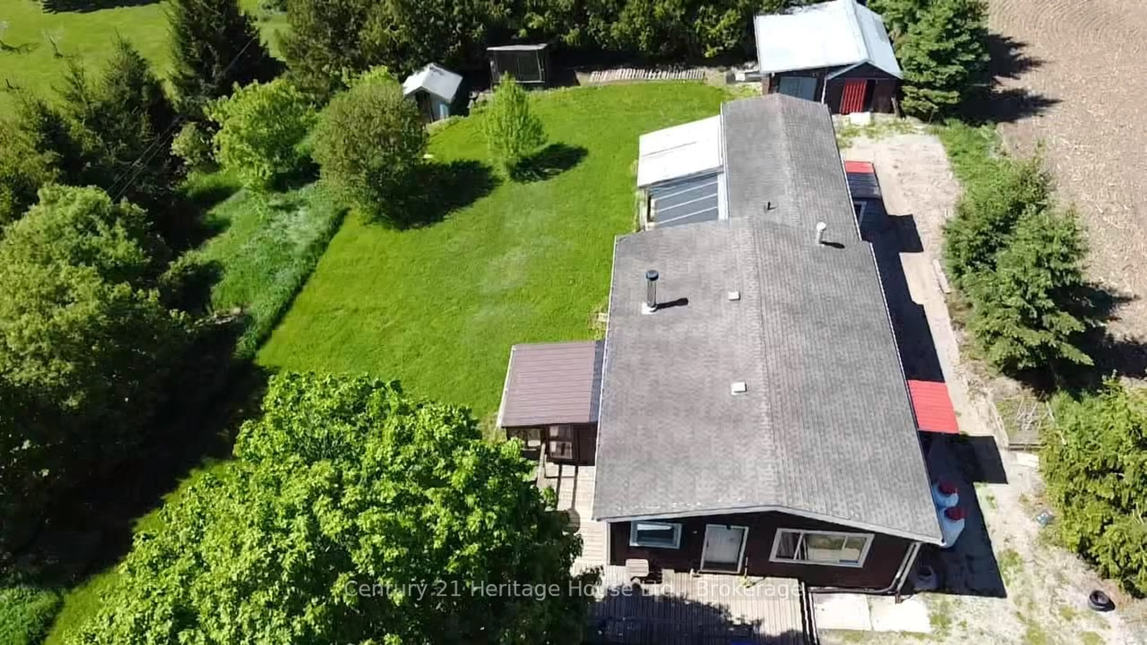 A pic from outside/outdoor area/front of a property/back of a property/a pic from drone, street for 522241 Concession 12, West Grey Ontario N0G 1S0