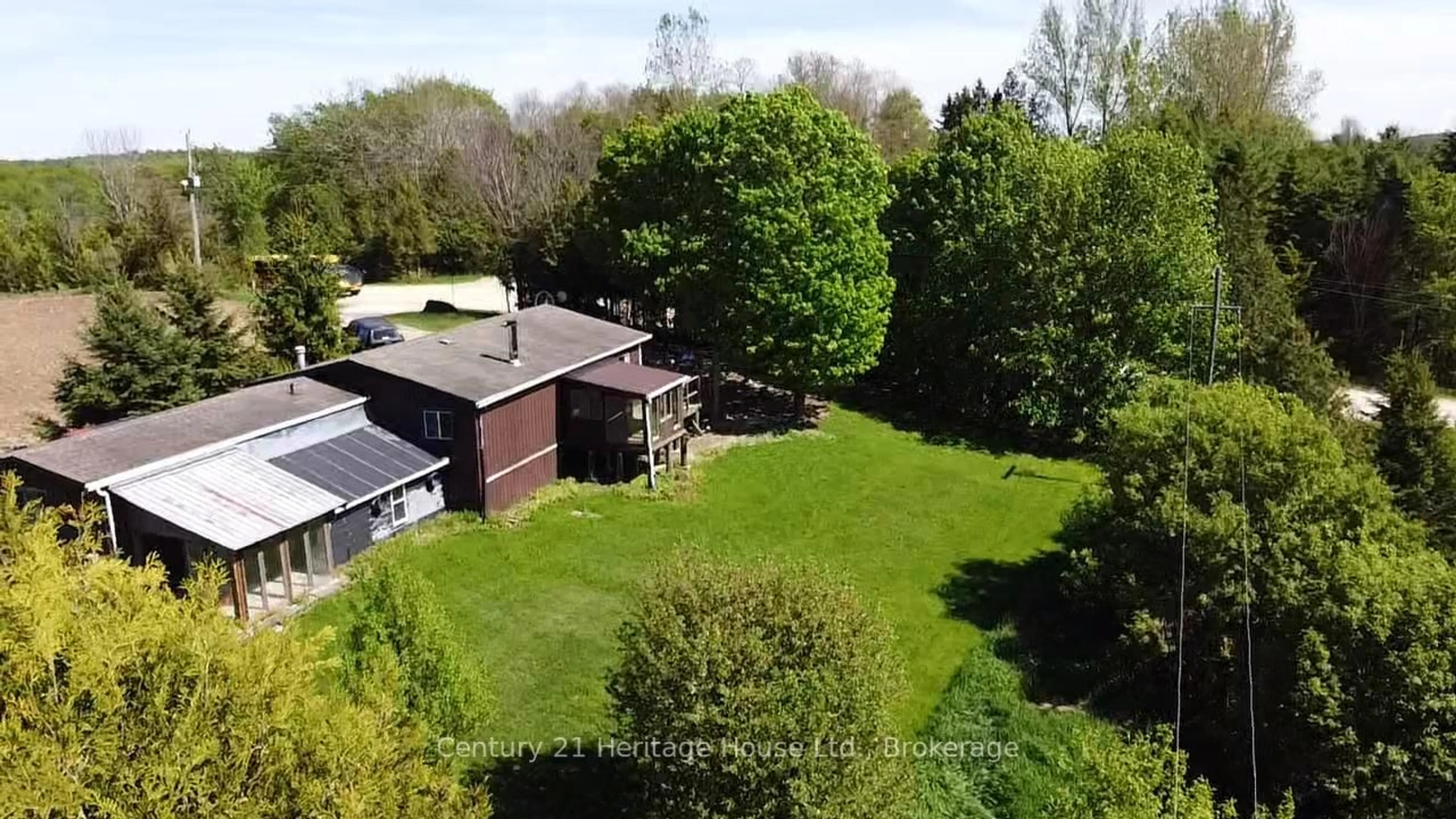 A pic from outside/outdoor area/front of a property/back of a property/a pic from drone, building for 522241 Concession 12, West Grey Ontario N0G 1S0