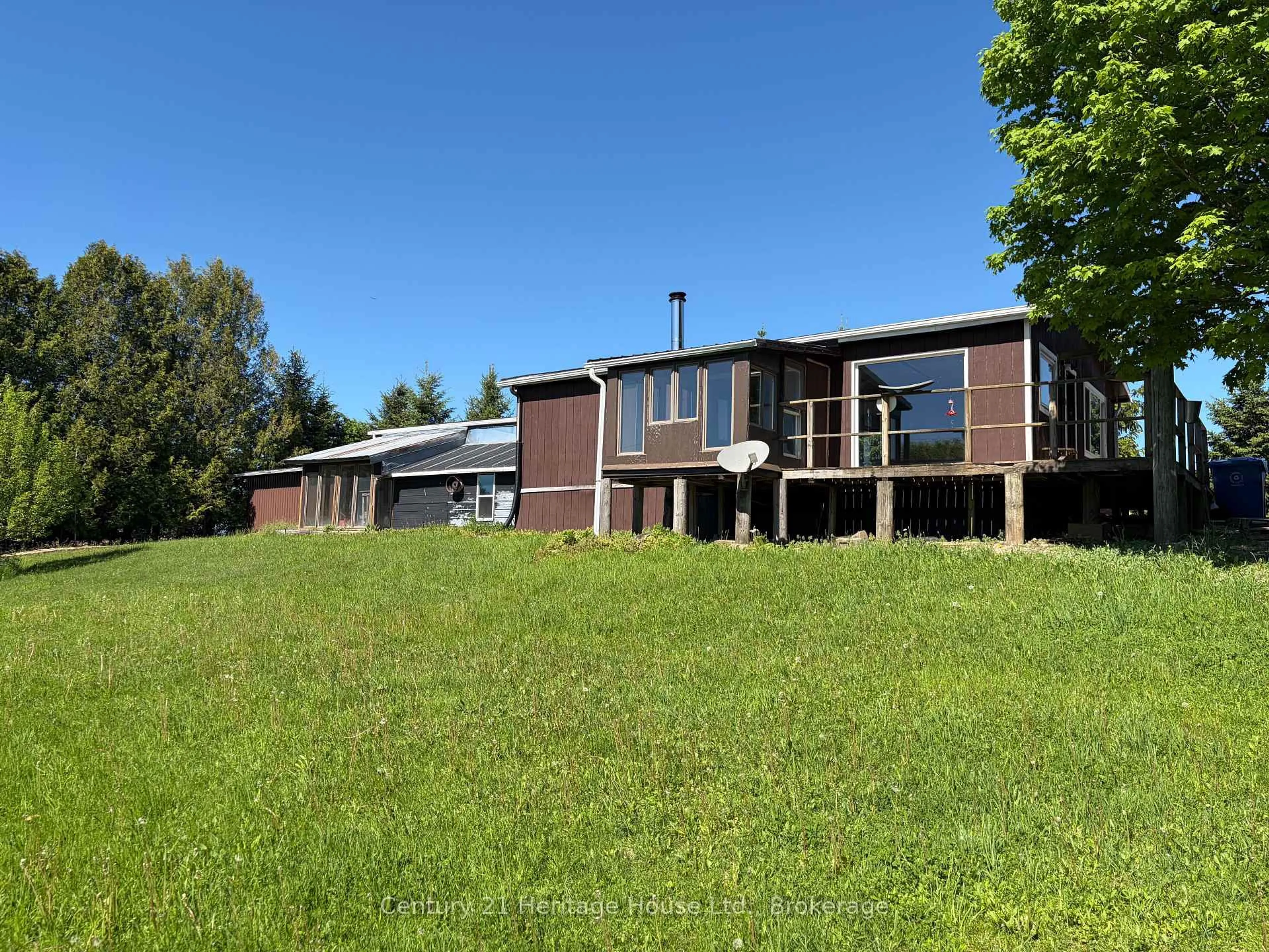 A pic from outside/outdoor area/front of a property/back of a property/a pic from drone, building for 522241 Concession 12, West Grey Ontario N0G 1S0