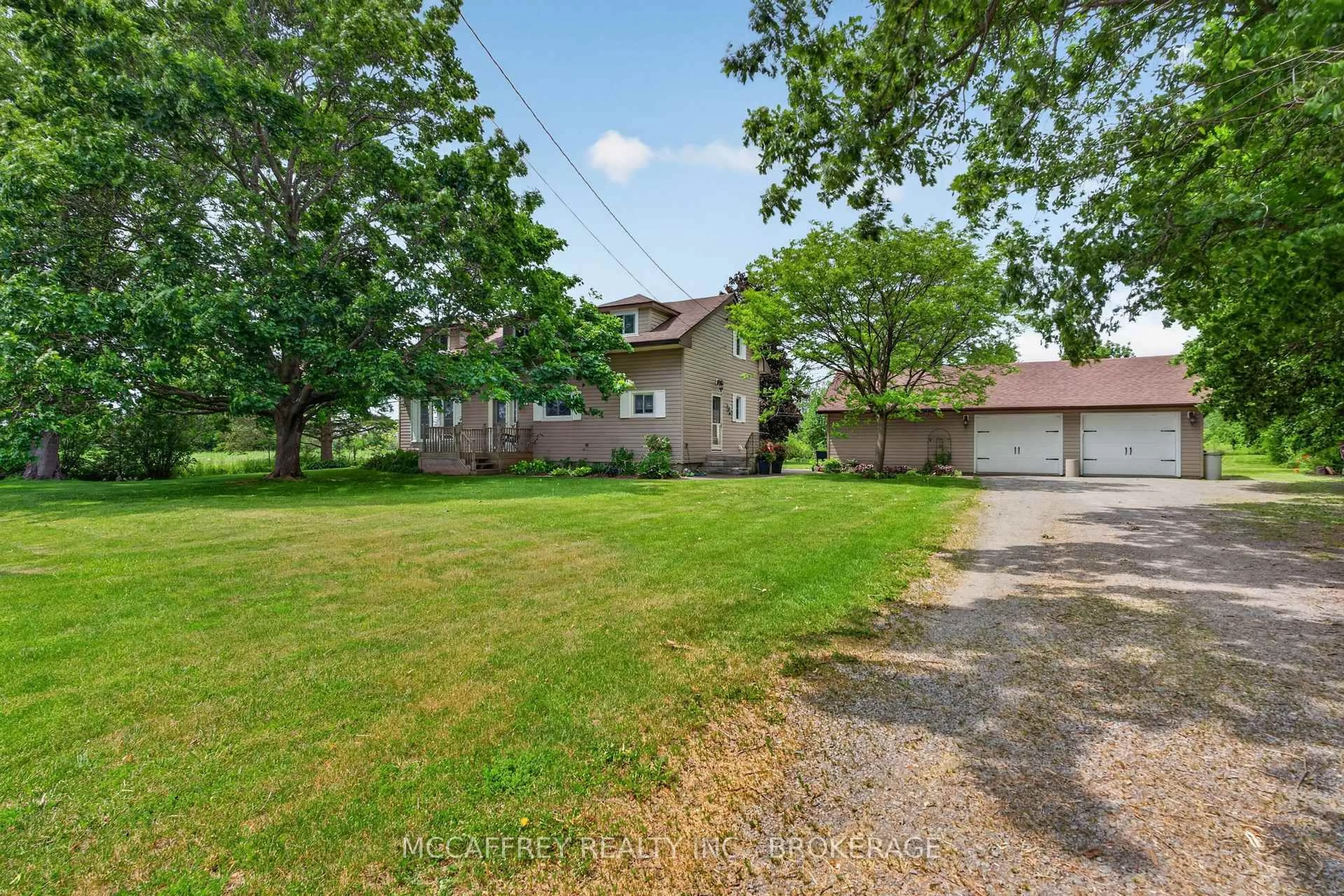 A pic from outside/outdoor area/front of a property/back of a property/a pic from drone, street for 1415 County Rd 5, Loyalist Ontario K7R 3K9
