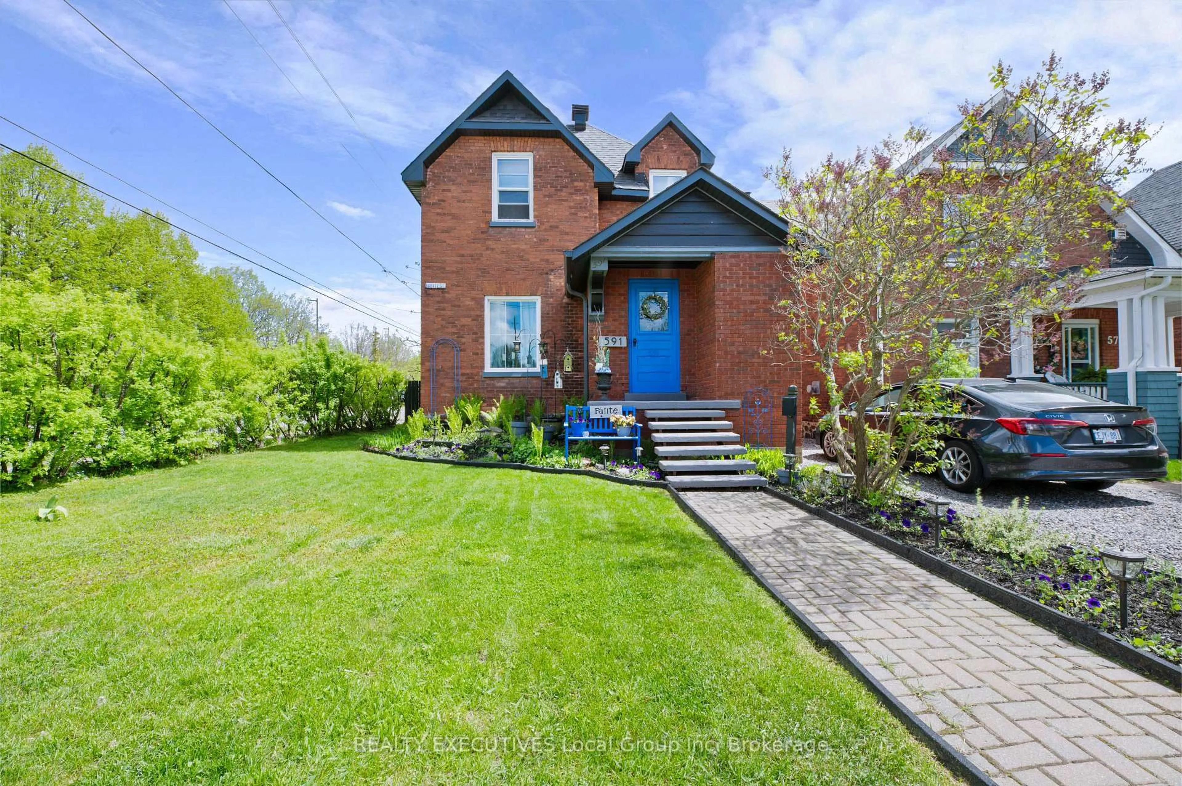 Home with brick exterior material, street for 591 HARVEY St, North Bay Ontario P1B 4H2