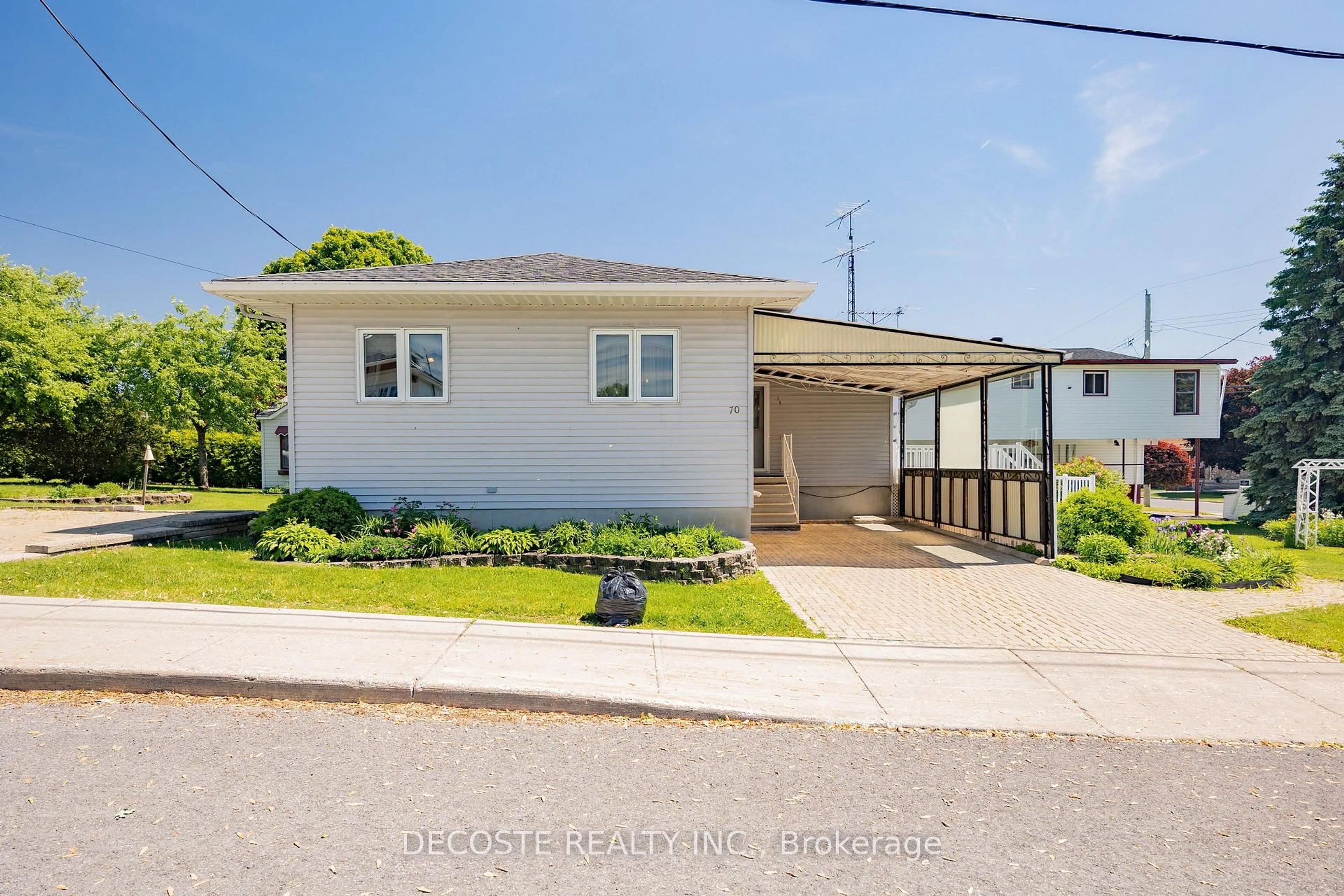 Home with vinyl exterior material, street for 70 Victoria St, North Glengarry Ontario K0C 1A0