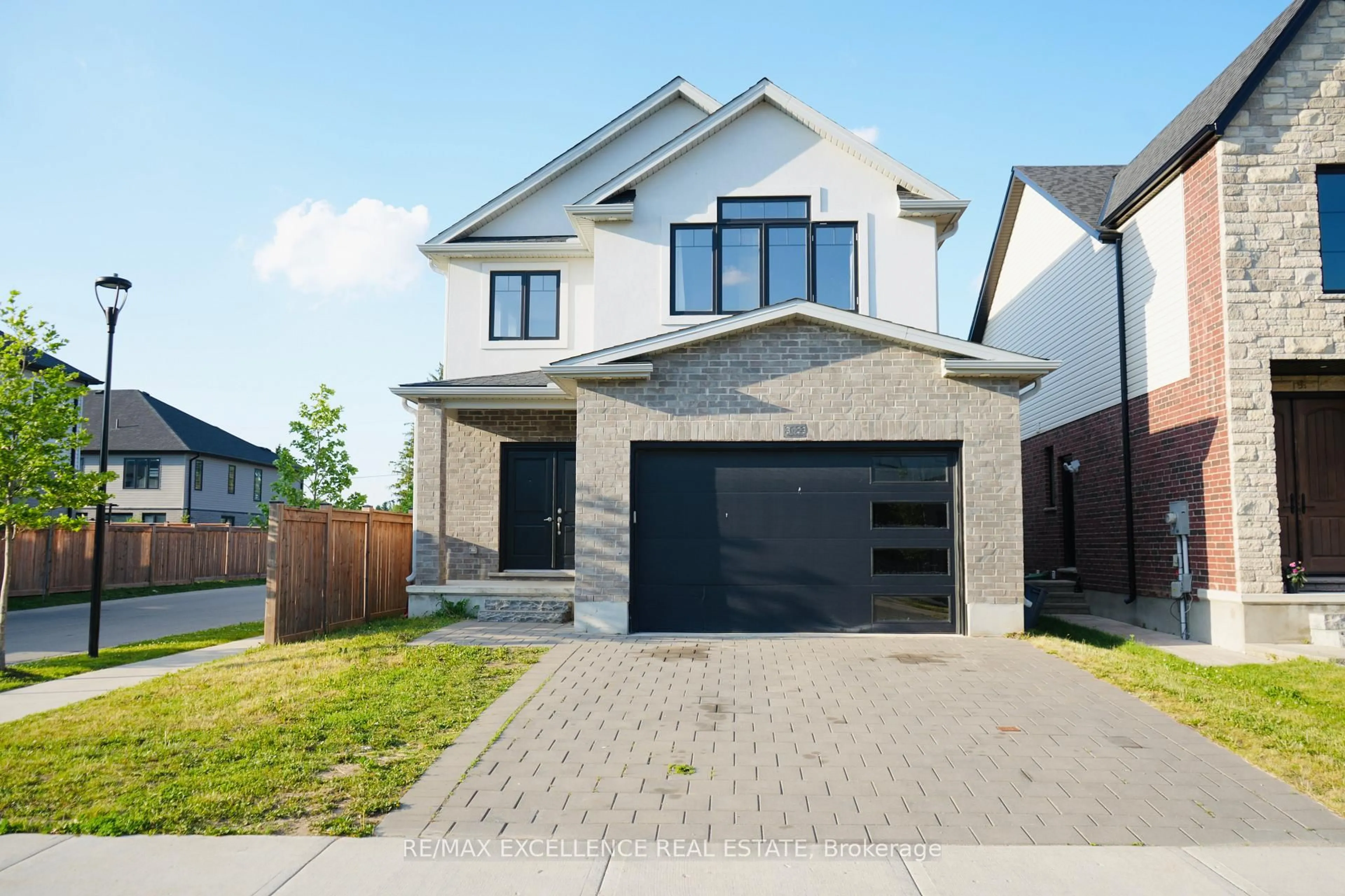 Home with brick exterior material, street for 3023 Doyle Dr, London South Ontario N6M 0G9
