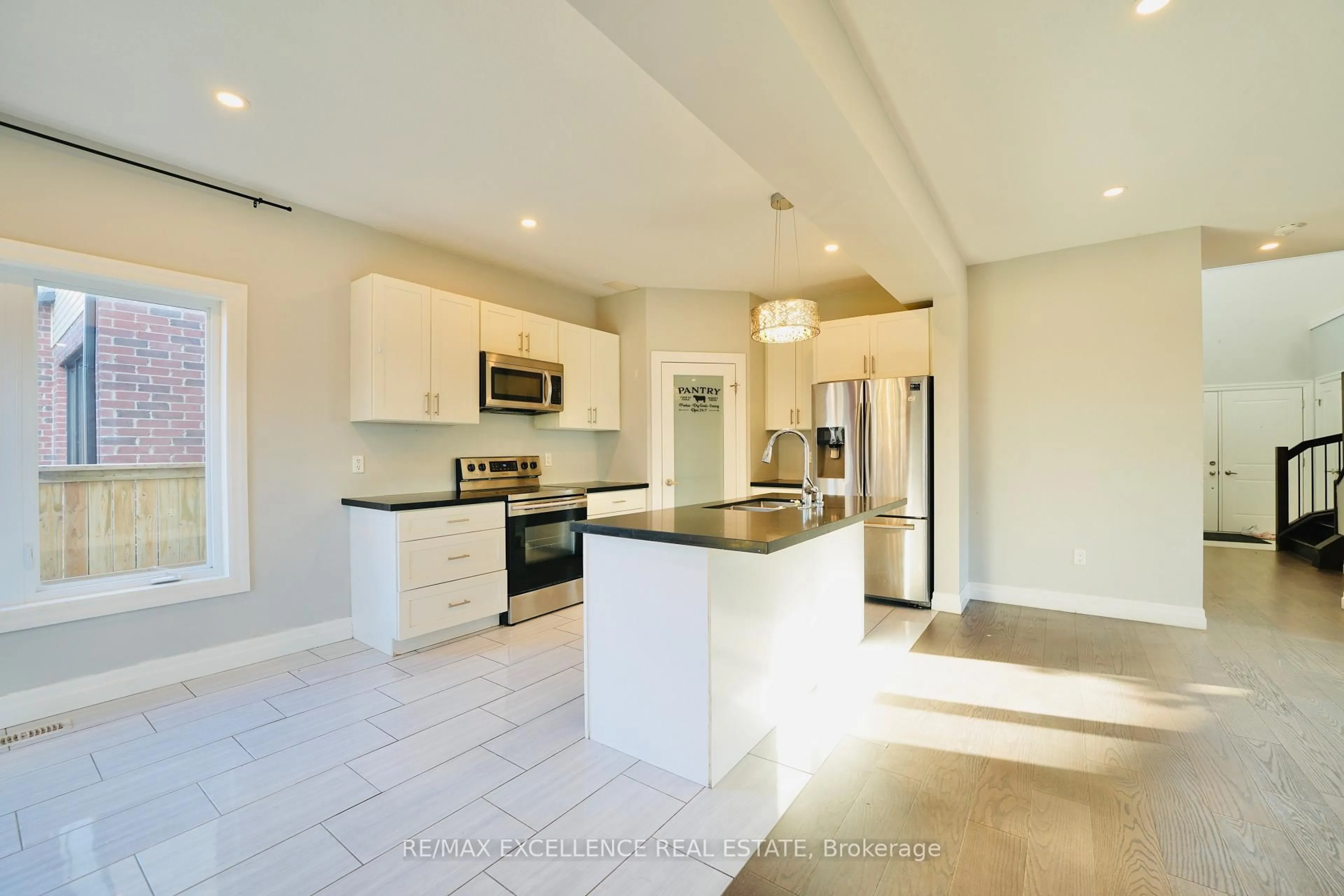 Open concept kitchen, ceramic/tile floor for 3023 Doyle Dr, London South Ontario N6M 0G9