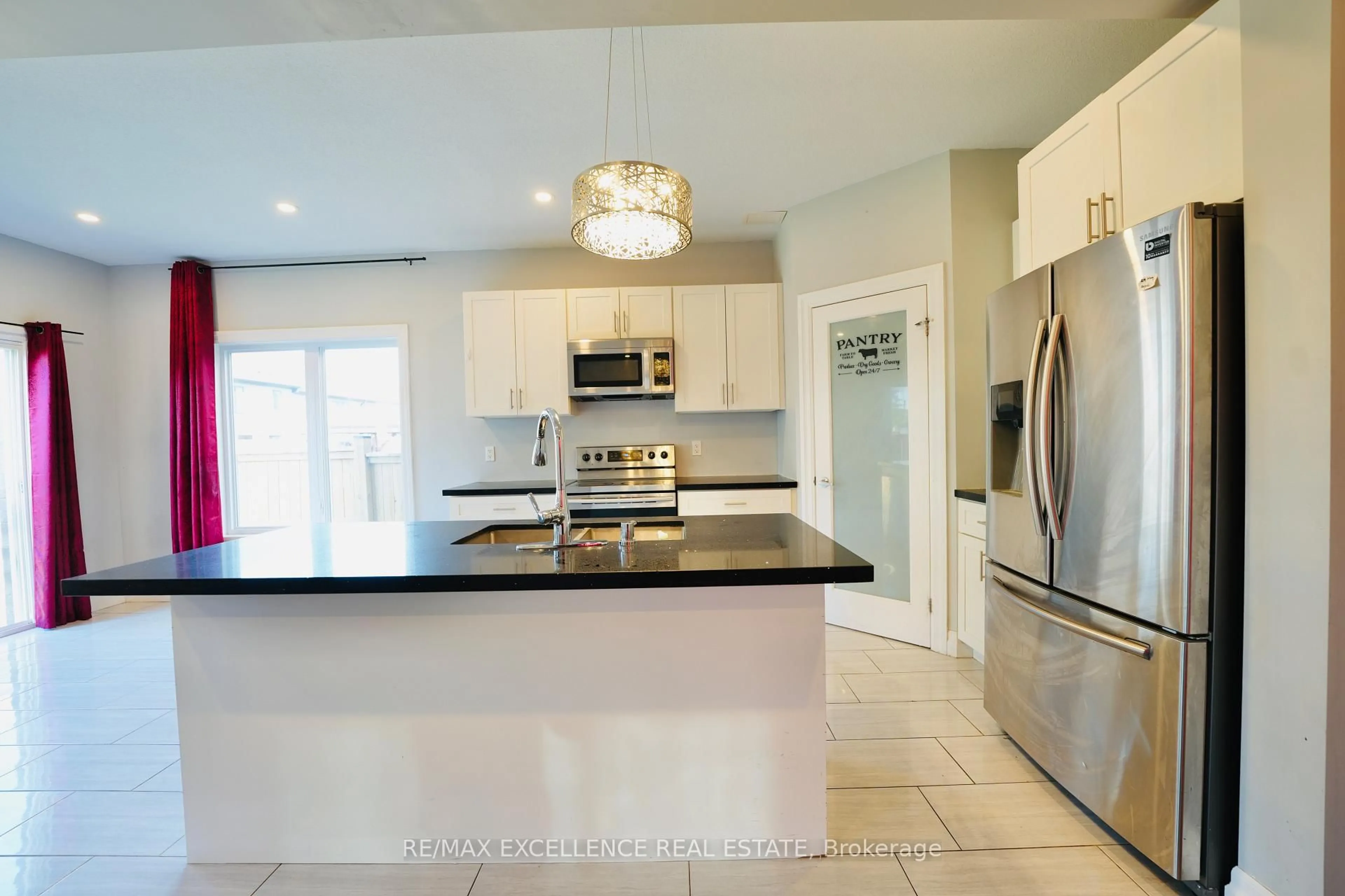 Open concept kitchen, ceramic/tile floor for 3023 Doyle Dr, London South Ontario N6M 0G9