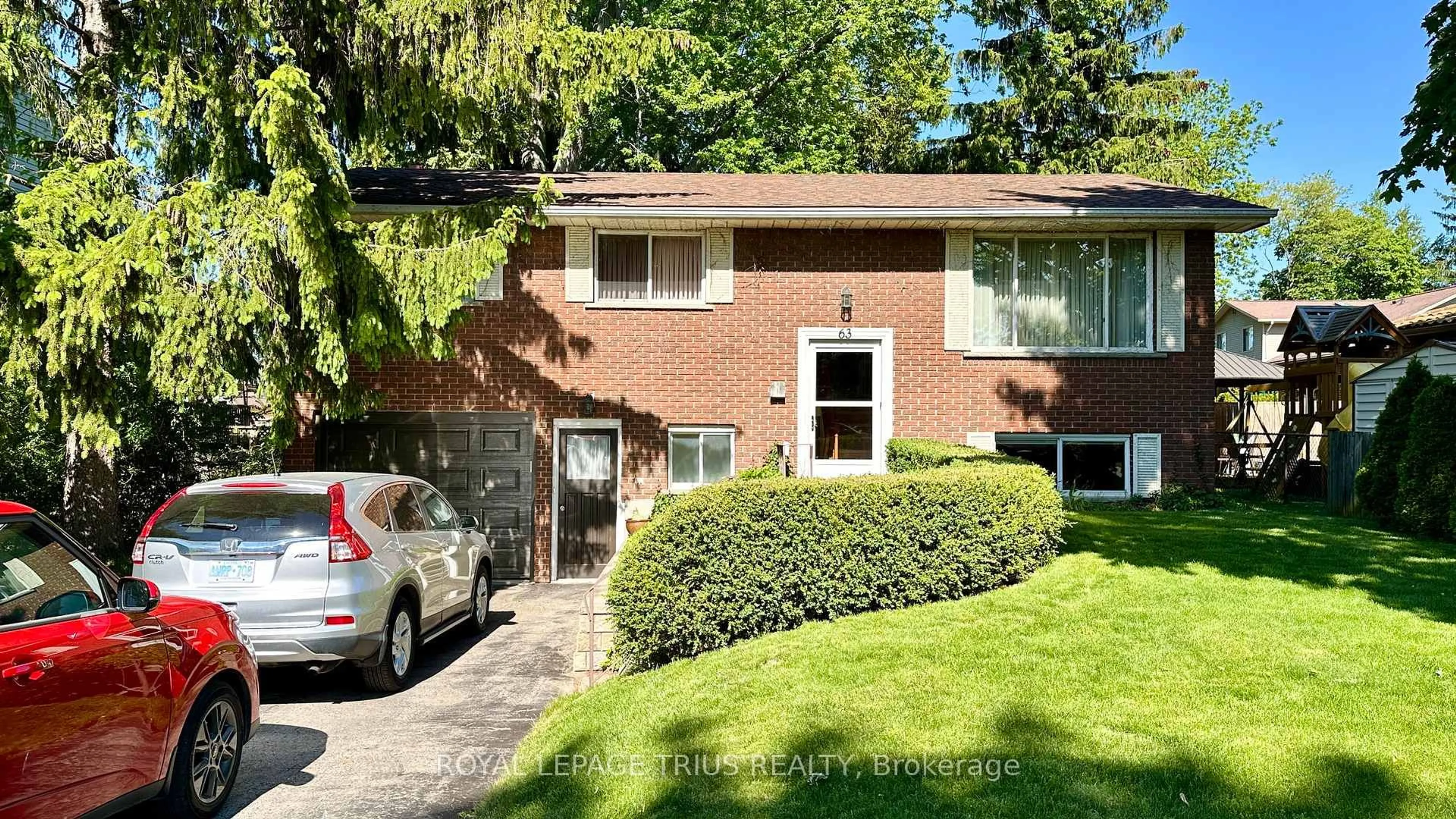 Home with brick exterior material, street for 63 Lee Ave, Norfolk Ontario N3Y 5B7