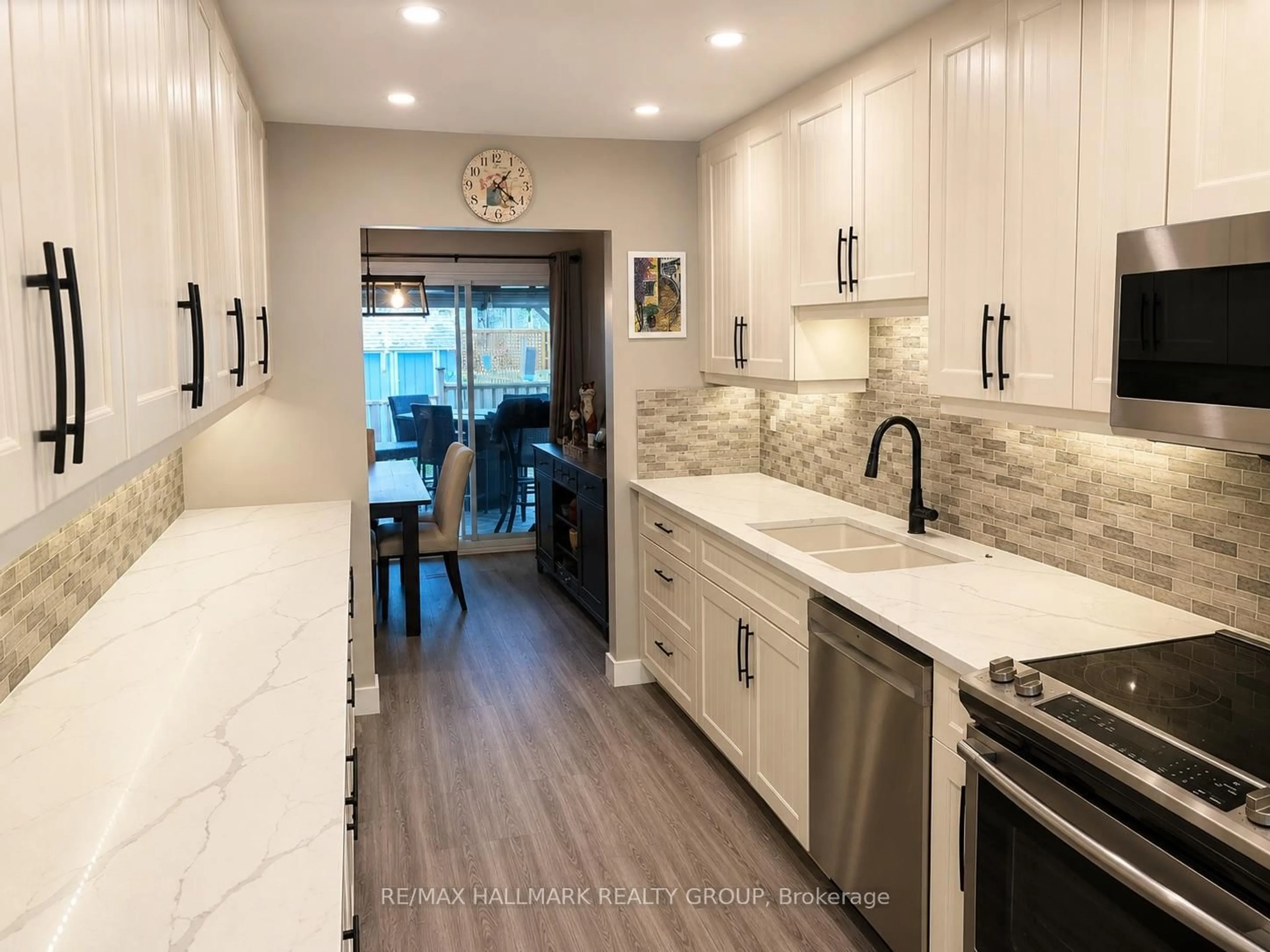 Open concept kitchen, ceramic/tile floor for 6352 Long Bow Gate, Orleans Ontario K1C 2X3