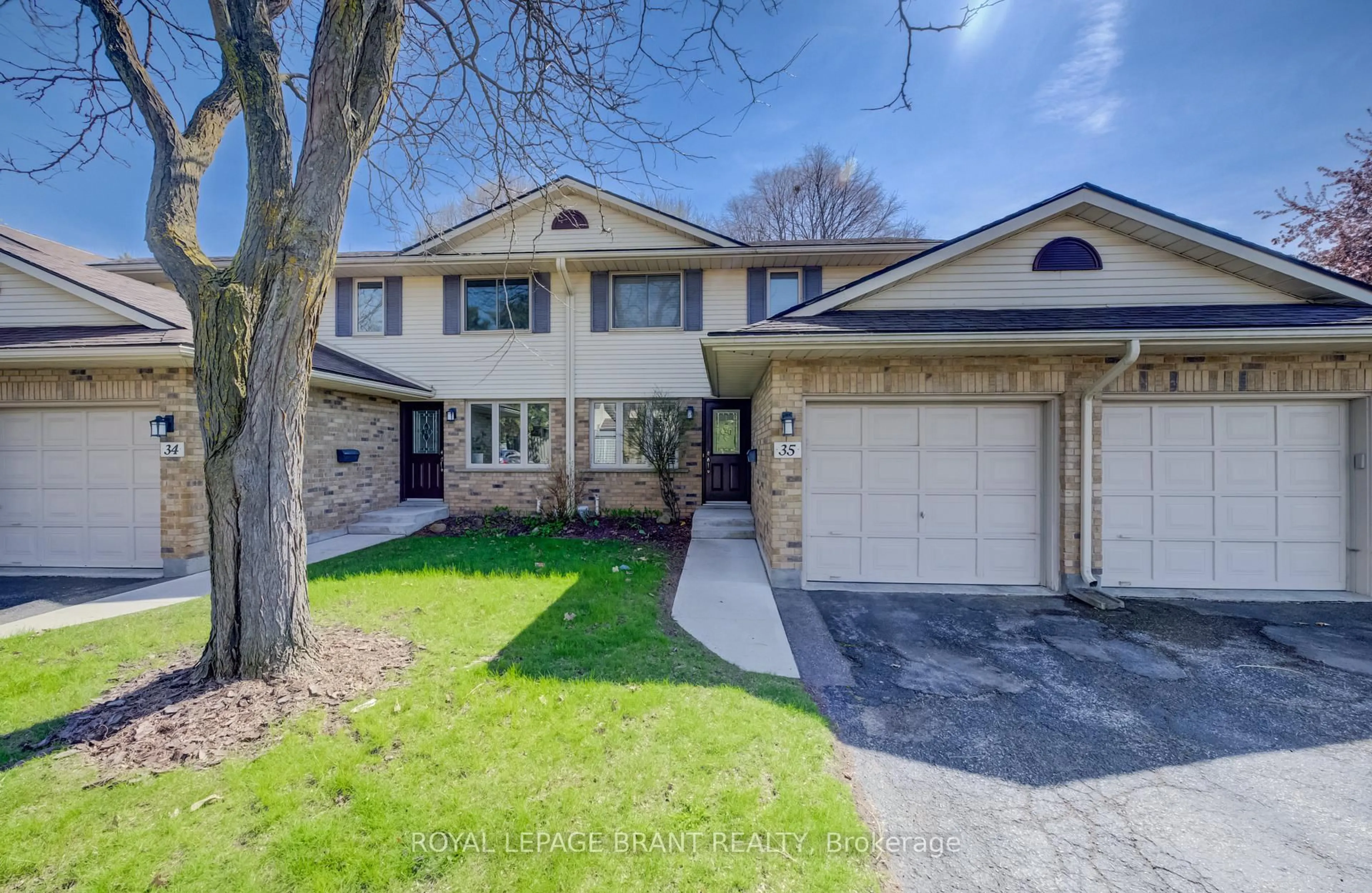 Home with brick exterior material, street for 375 Kingscourt Dr #35, Waterloo Ontario N2K 3N7