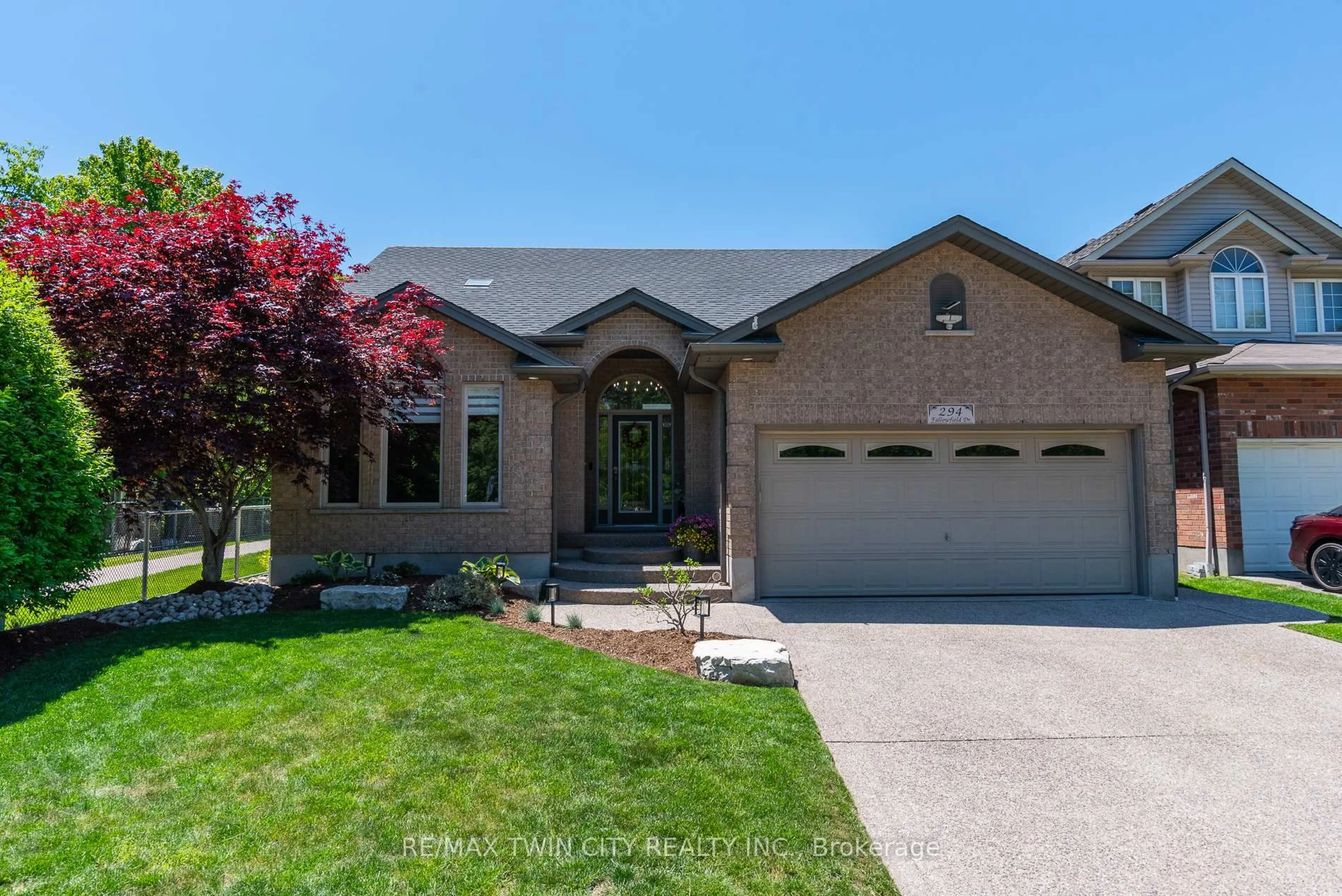 Home with brick exterior material, street for 294 Fallowfield Dr, Kitchener Ontario N2C 2T8