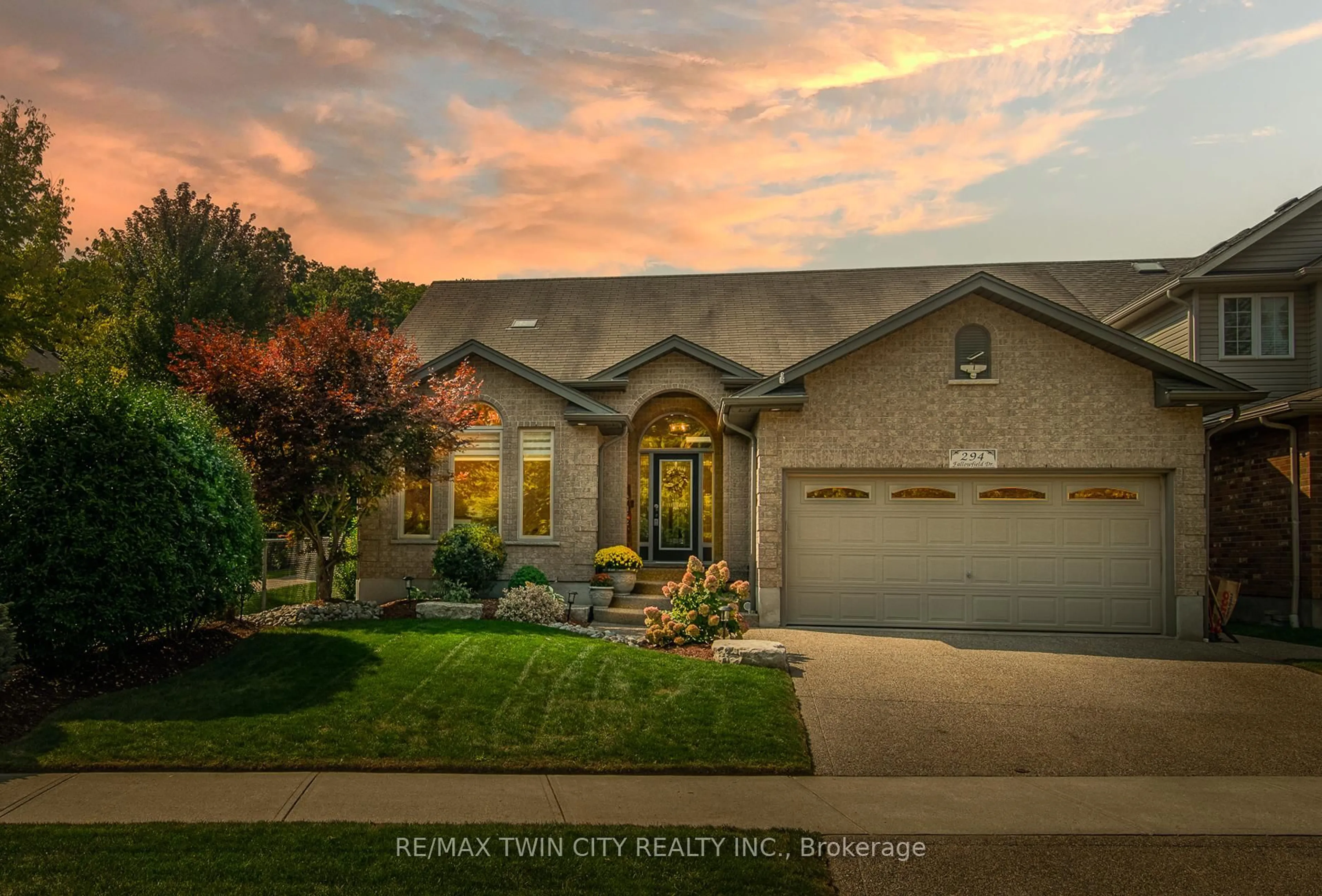 Home with brick exterior material, street for 294 Fallowfield Dr, Kitchener Ontario N2C 2T8
