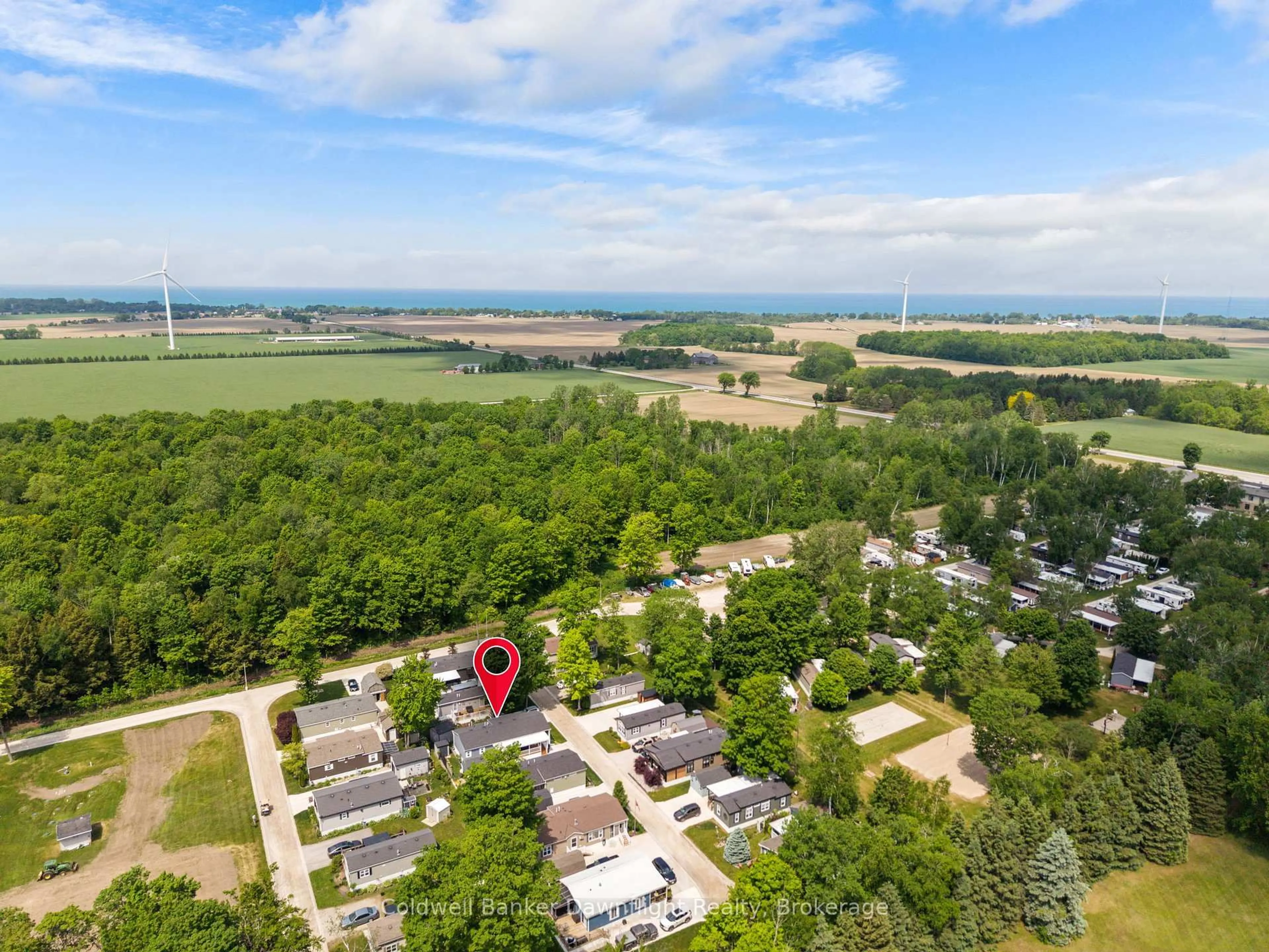 A pic from outside/outdoor area/front of a property/back of a property/a pic from drone, unknown for 36501 Dashwood Rd #110, South Huron Ontario N0M 1N0