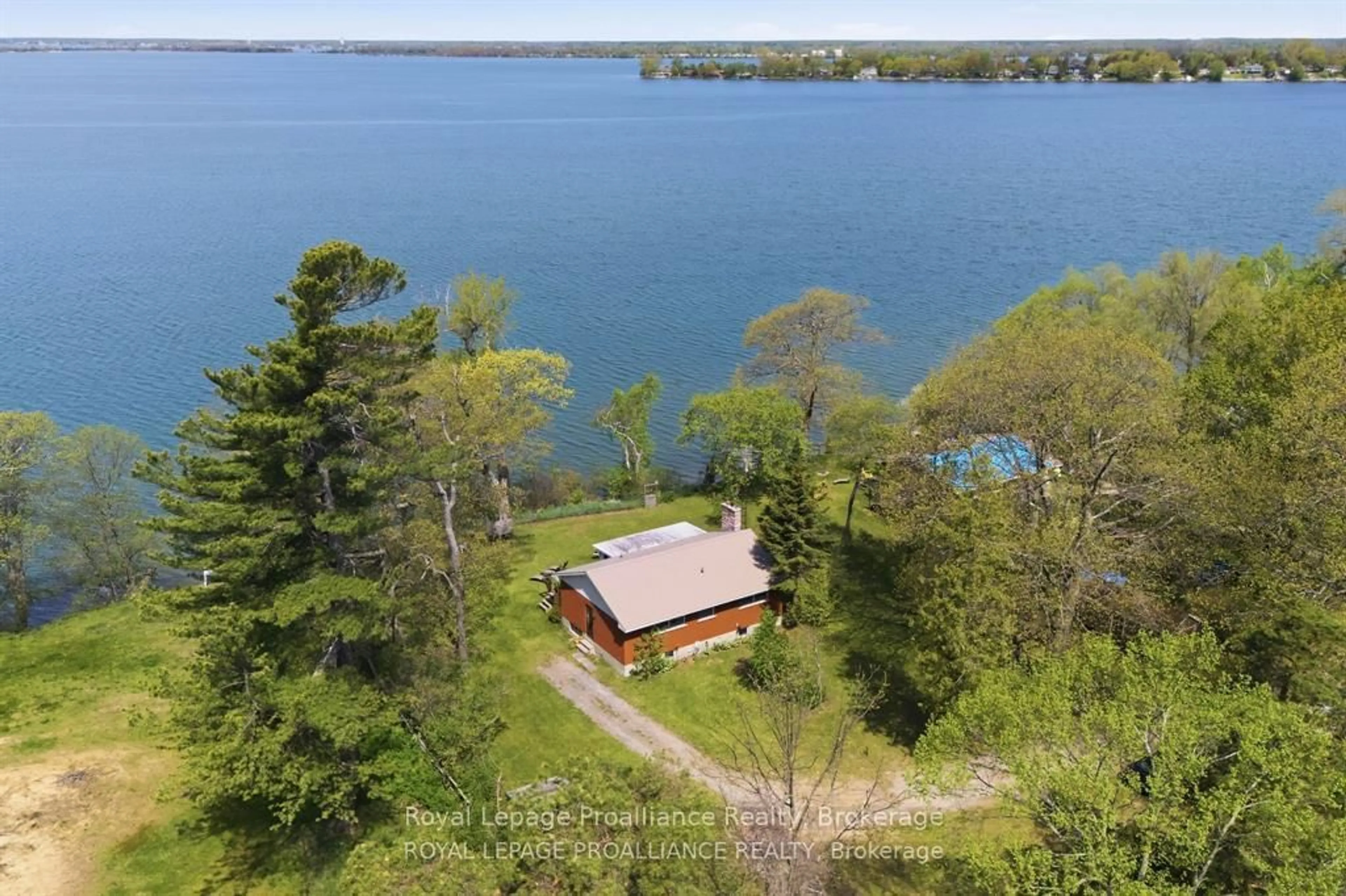 A pic from outside/outdoor area/front of a property/back of a property/a pic from drone, water/lake/river/ocean view for 40 Mayne Lane, Prince Edward County Ontario K0K 2T0