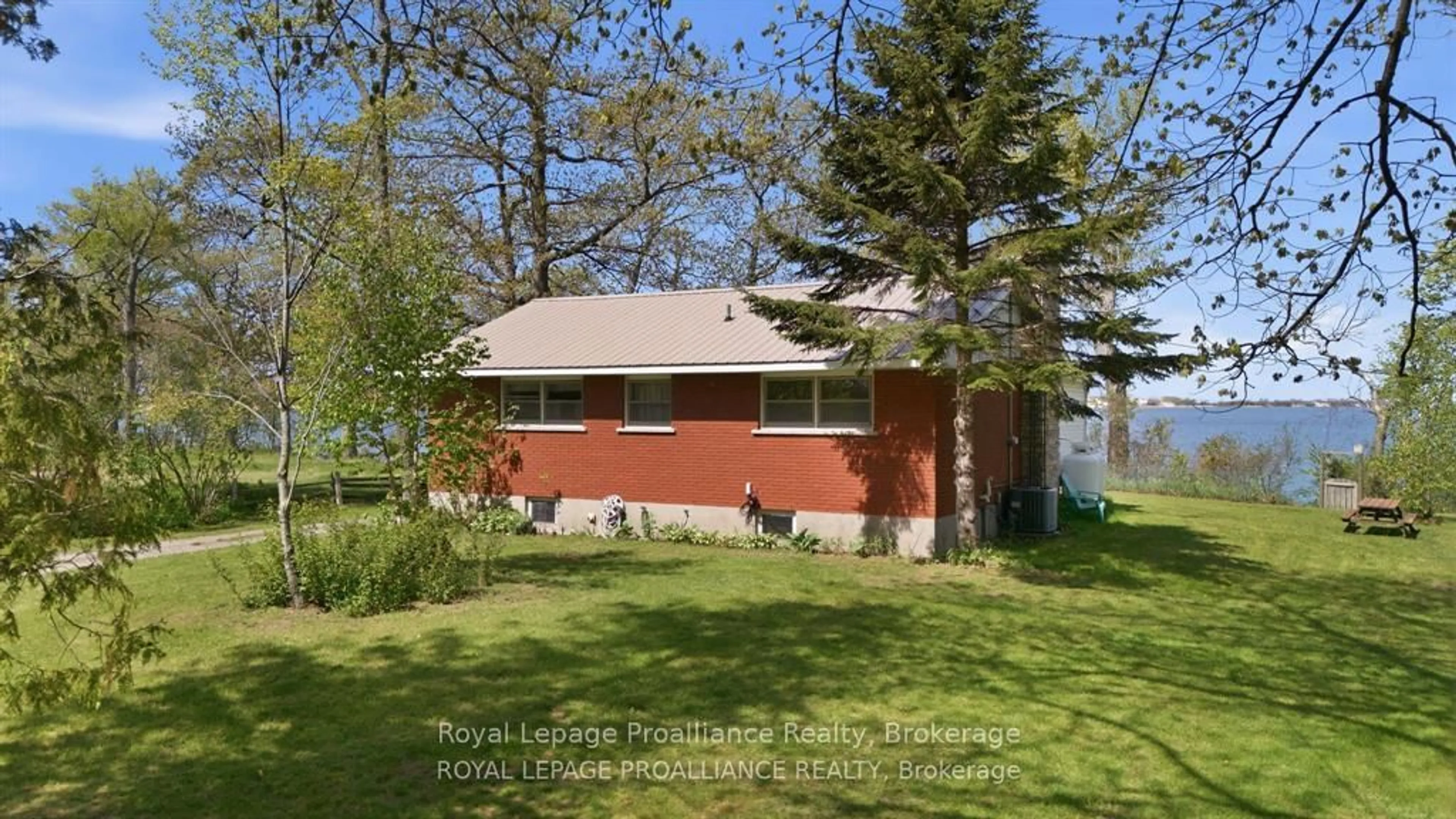 Home with vinyl exterior material, street for 40 Mayne Lane, Prince Edward County Ontario K0K 2T0