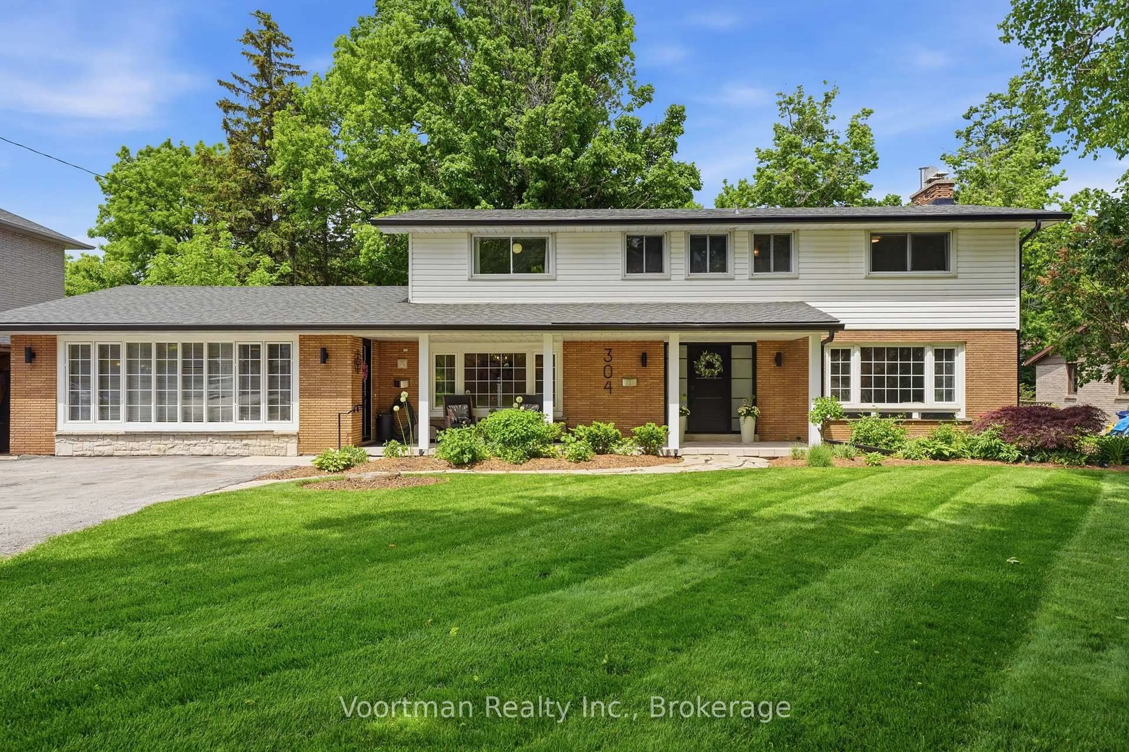 Home with brick exterior material, street for 304 Stone Church Rd, Hamilton Ontario L9B 1A4