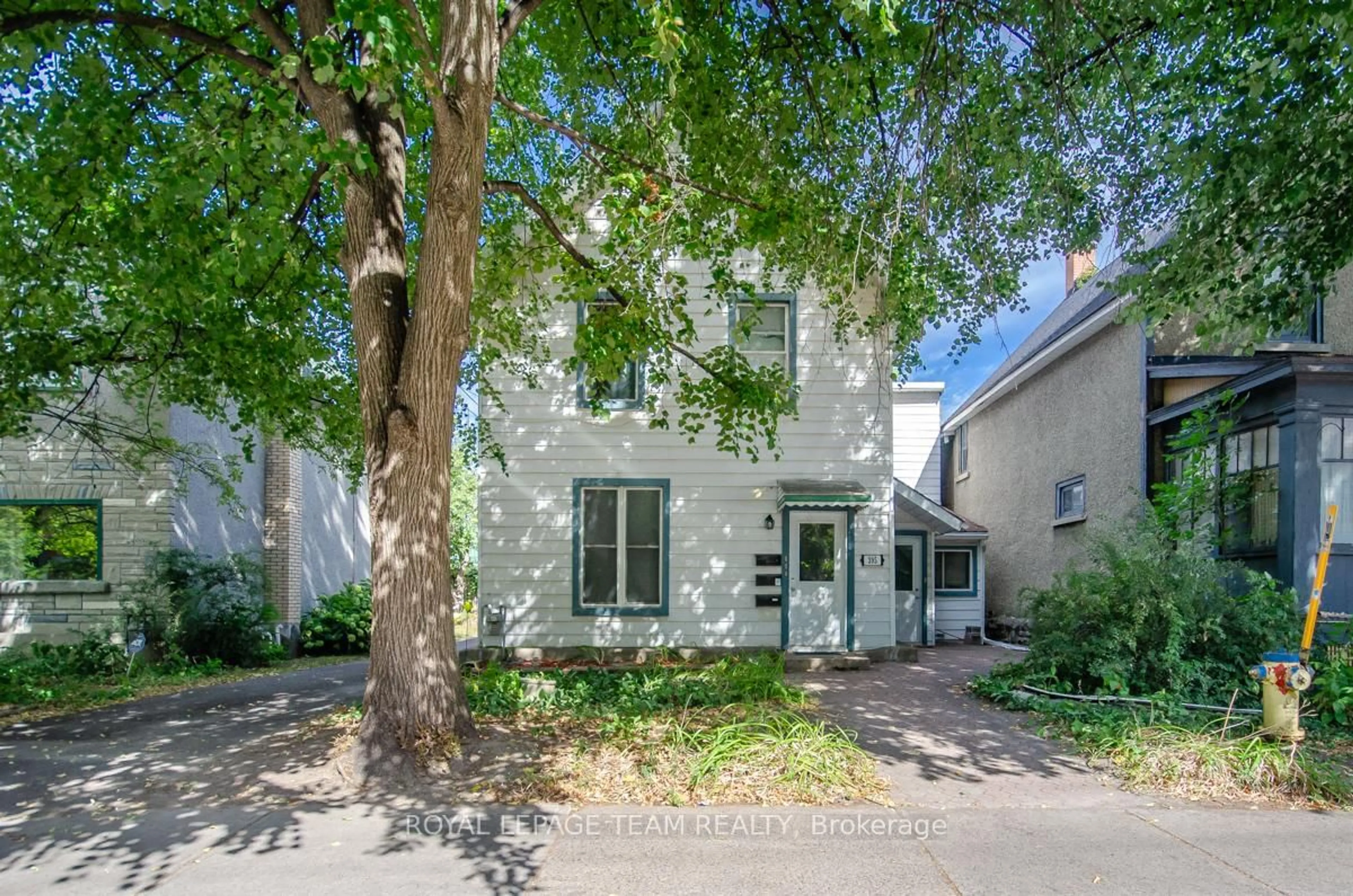 Home with brick exterior material, street for 395 Mcleod St, Ottawa Ontario K2P 1A5