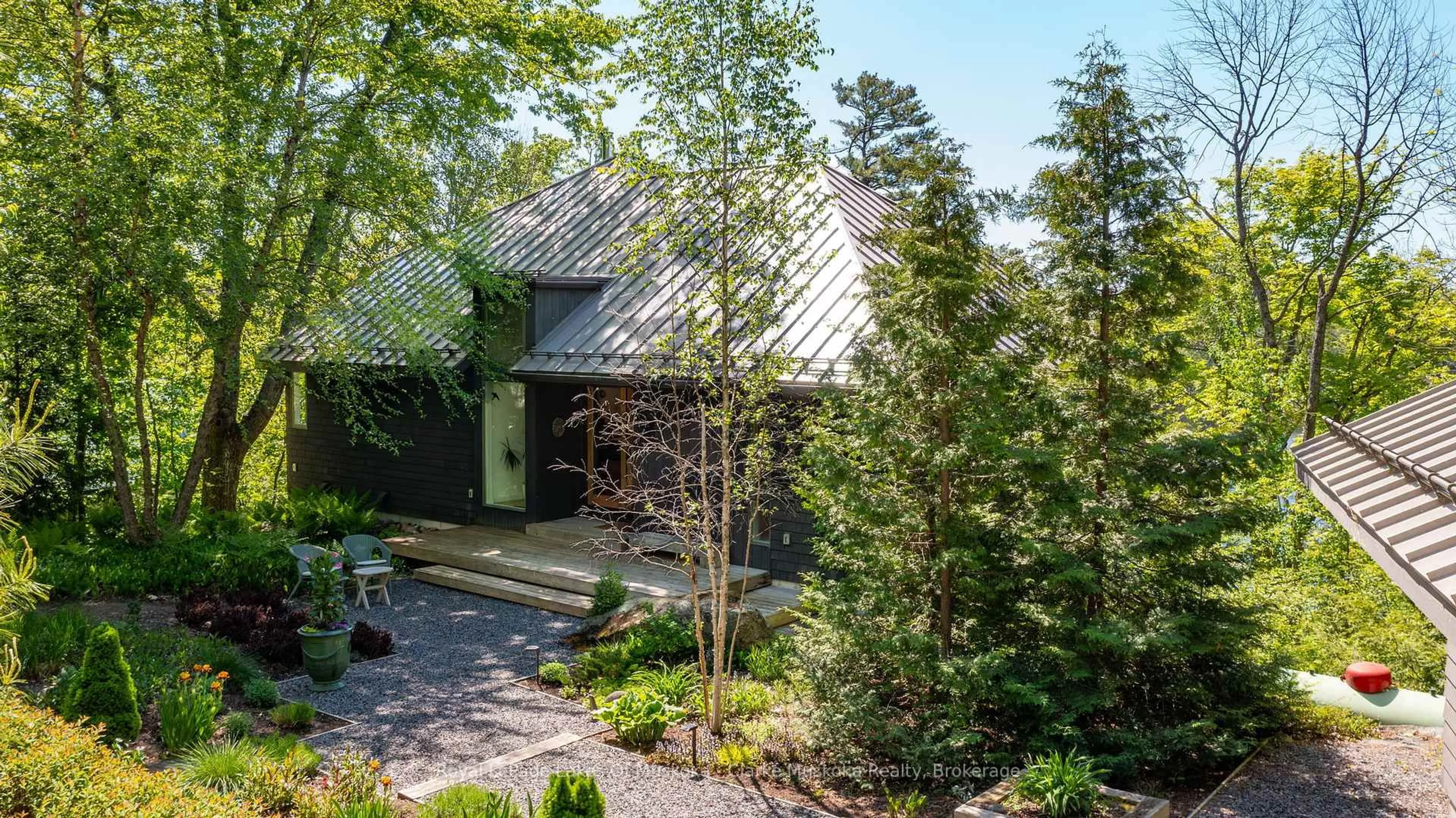 A pic from outside/outdoor area/front of a property/back of a property/a pic from drone, forest/trees view for 7 Rice Street, Seguin Ontario P0C 1J0