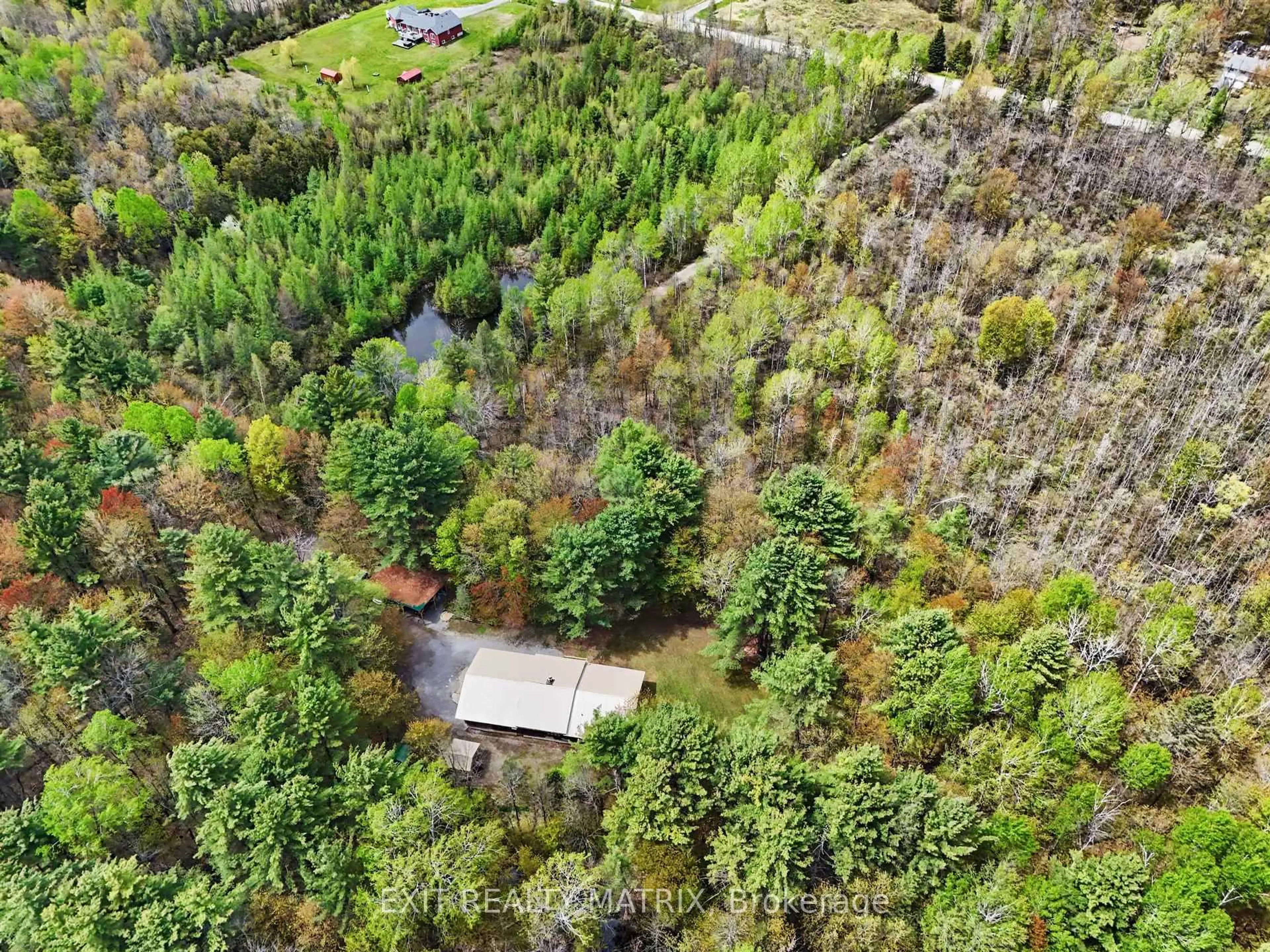 A pic from outside/outdoor area/front of a property/back of a property/a pic from drone, forest/trees view for 5749 Skakum Rd, Augusta Ontario K0E 1T0
