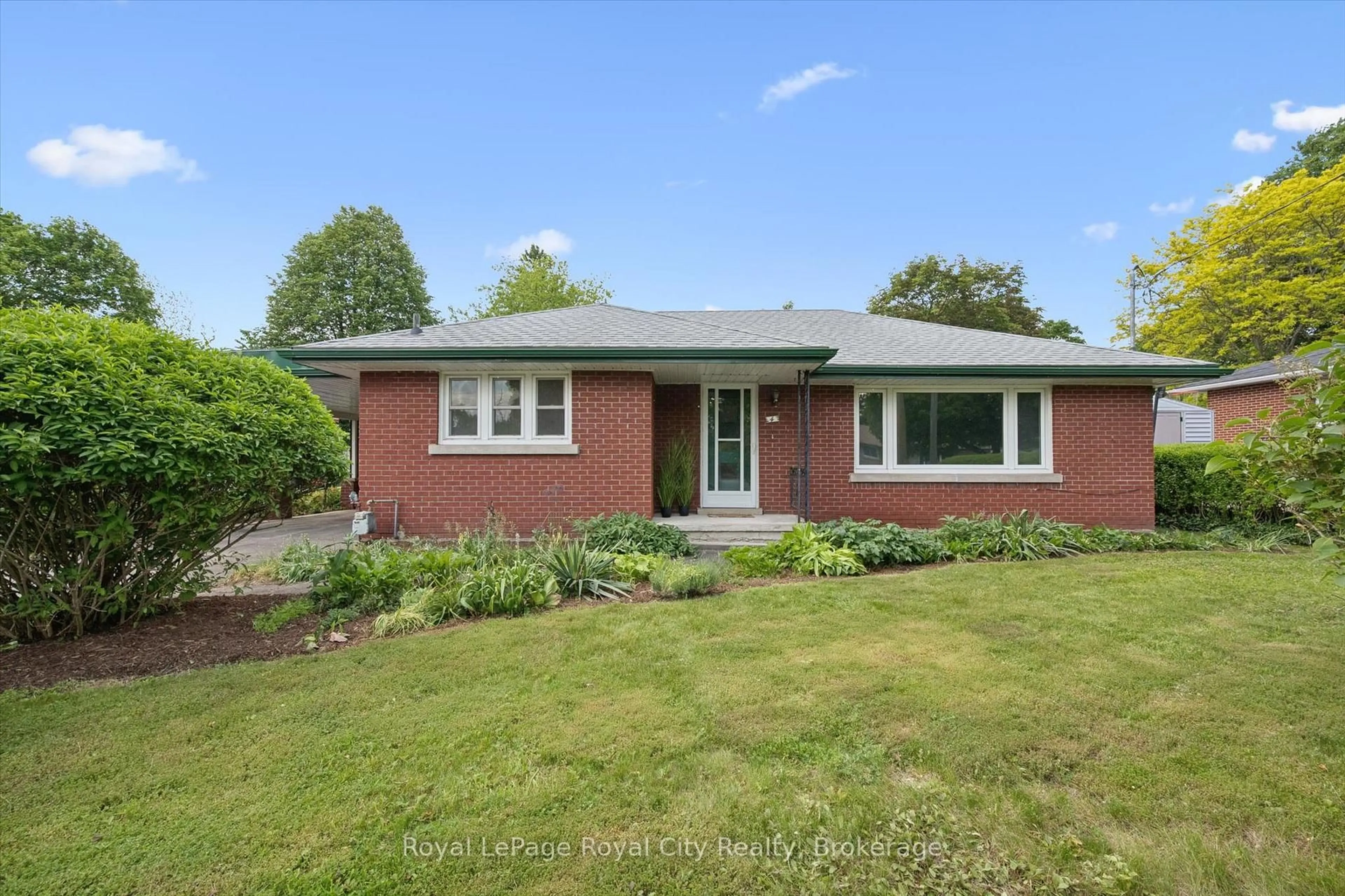 Home with brick exterior material, street for 4 Campion Ave, Guelph Ontario N1H 5L3