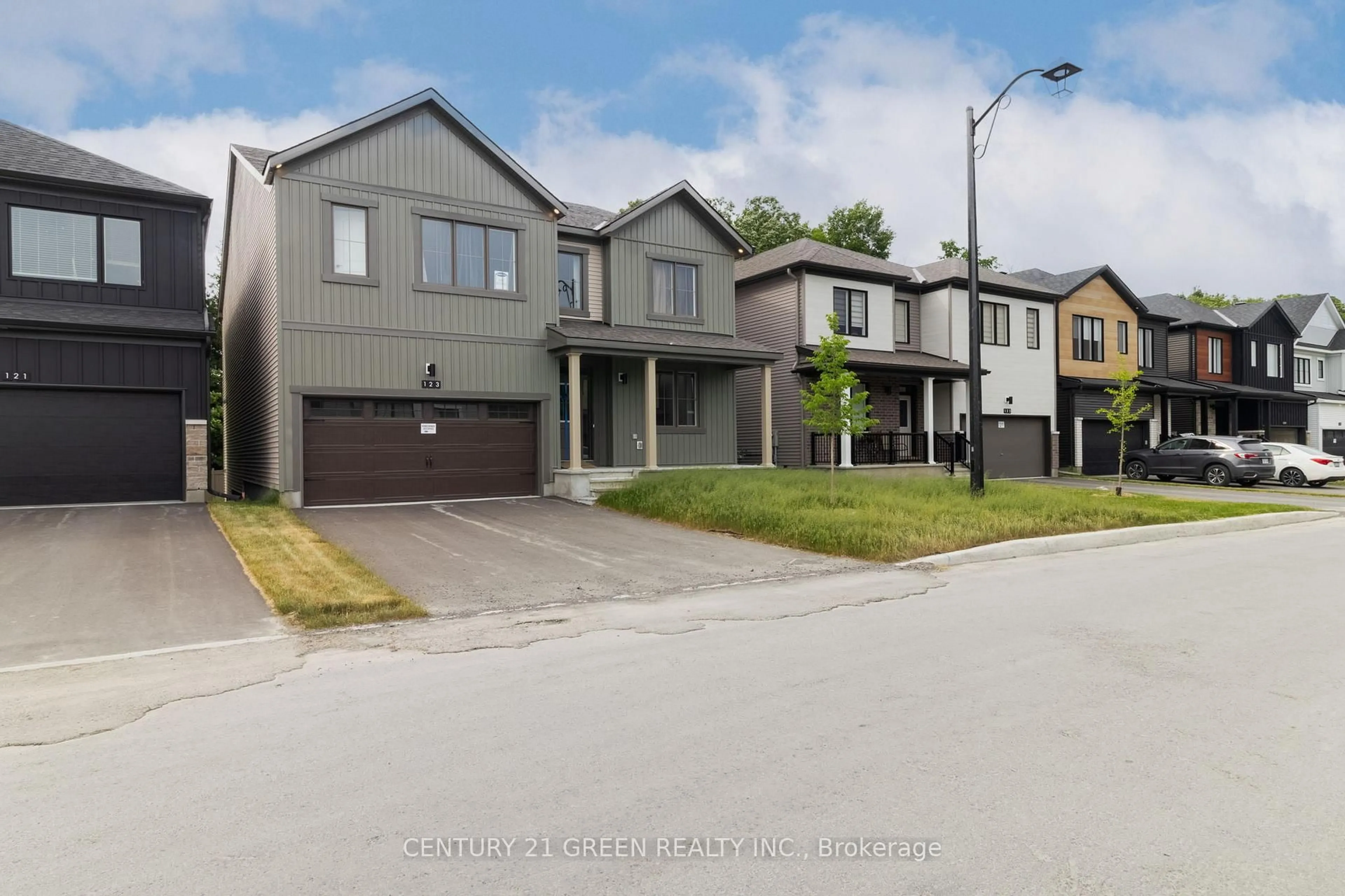 A pic from outside/outdoor area/front of a property/back of a property/a pic from drone, street for 123 Tonic Cres, Ottawa Ontario K2K 1X7