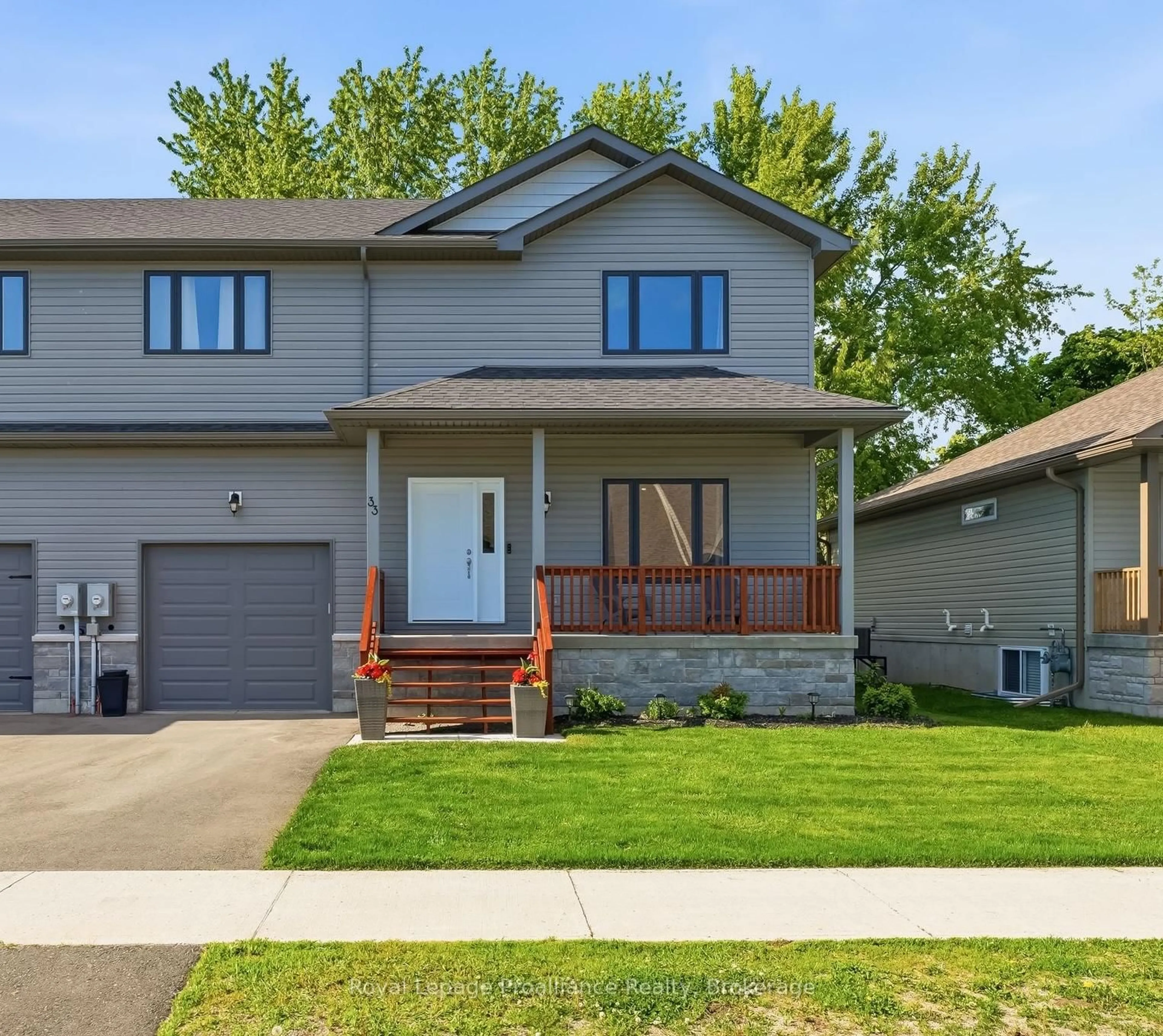 Home with vinyl exterior material, street for 33 Rabbit Rd, Brighton Ontario K0K 1H0