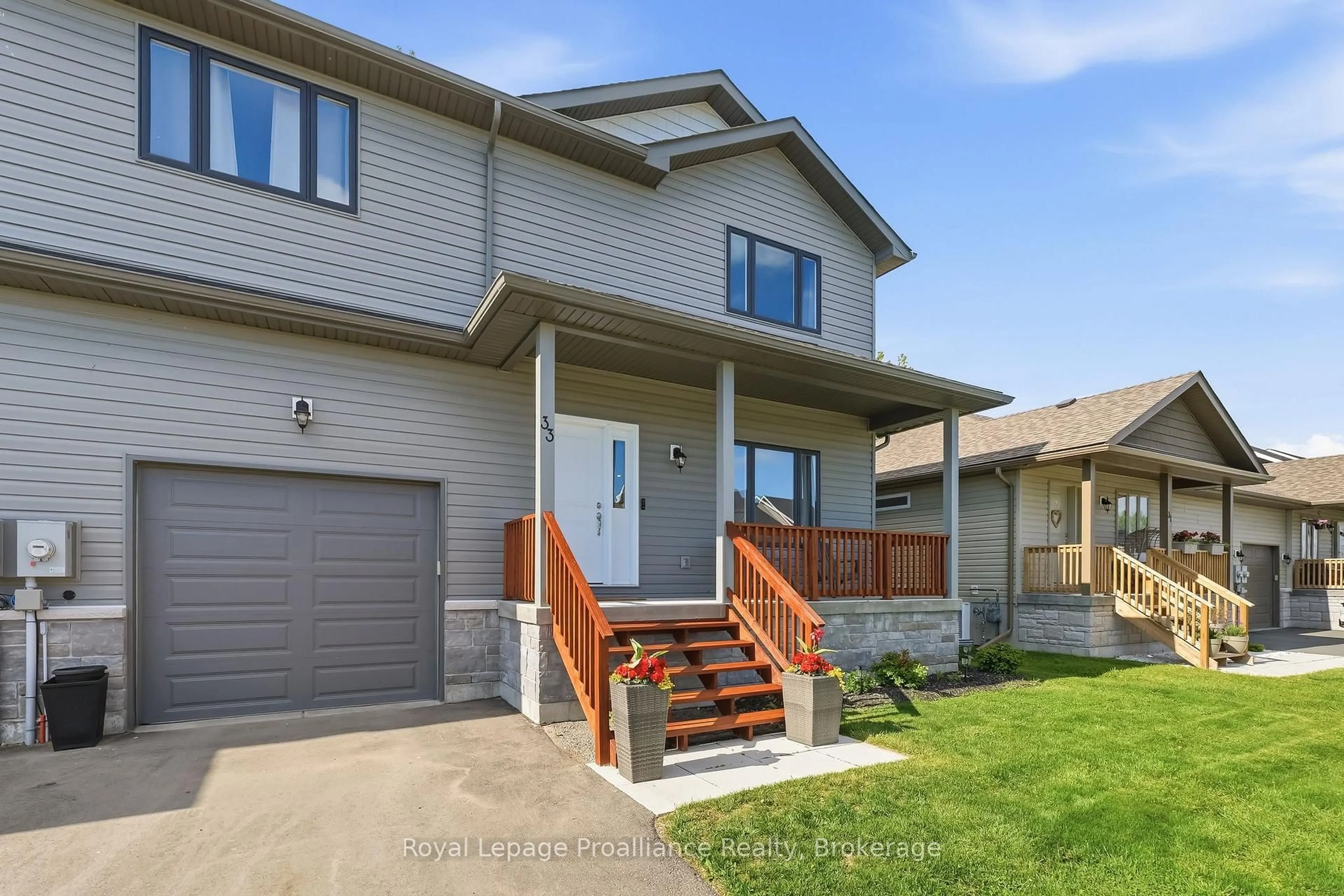 Home with vinyl exterior material, street for 33 Rabbit Rd, Brighton Ontario K0K 1H0