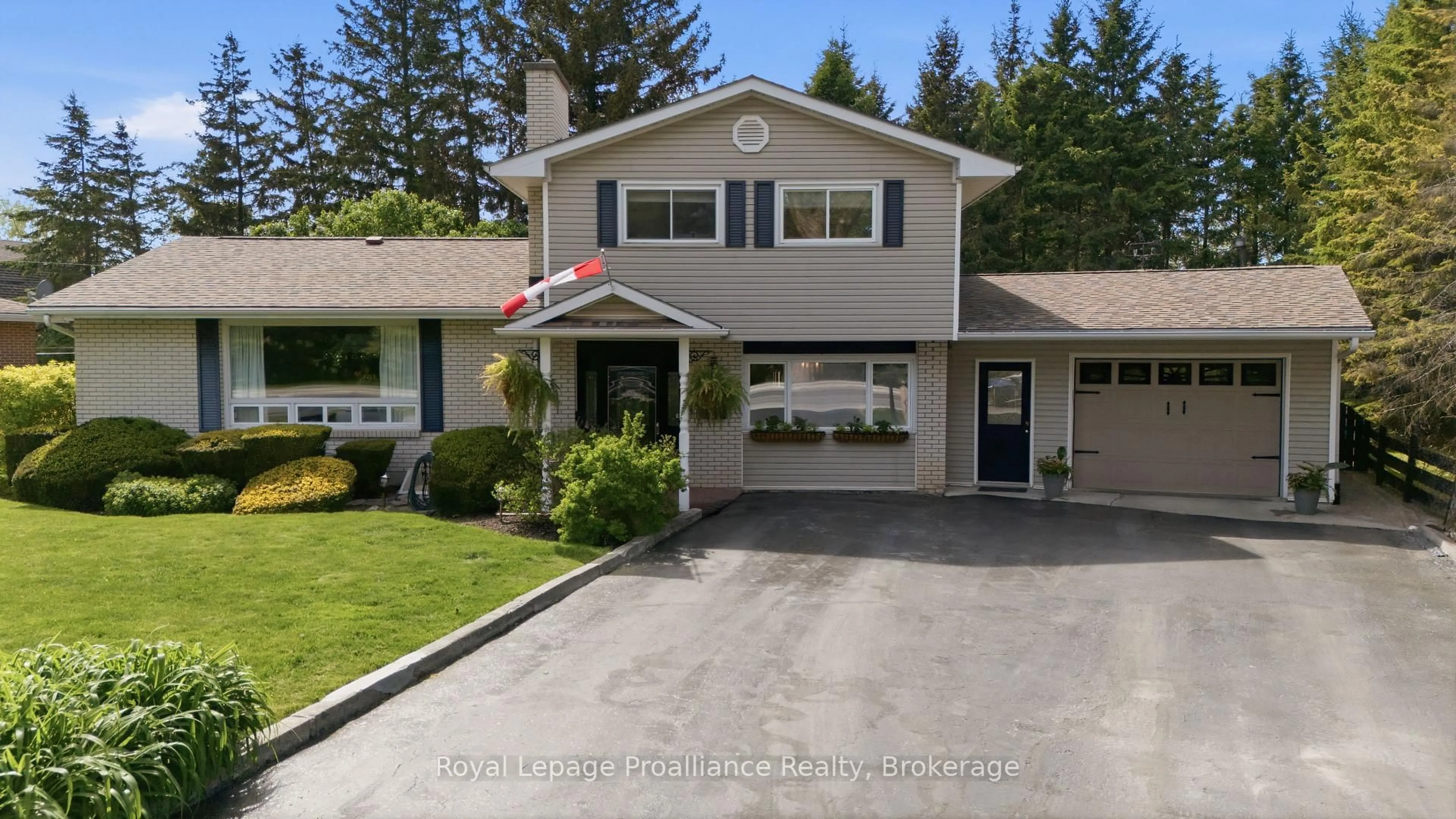 Home with vinyl exterior material, street for 445 Highway 49, Prince Edward County Ontario K0K 2T0