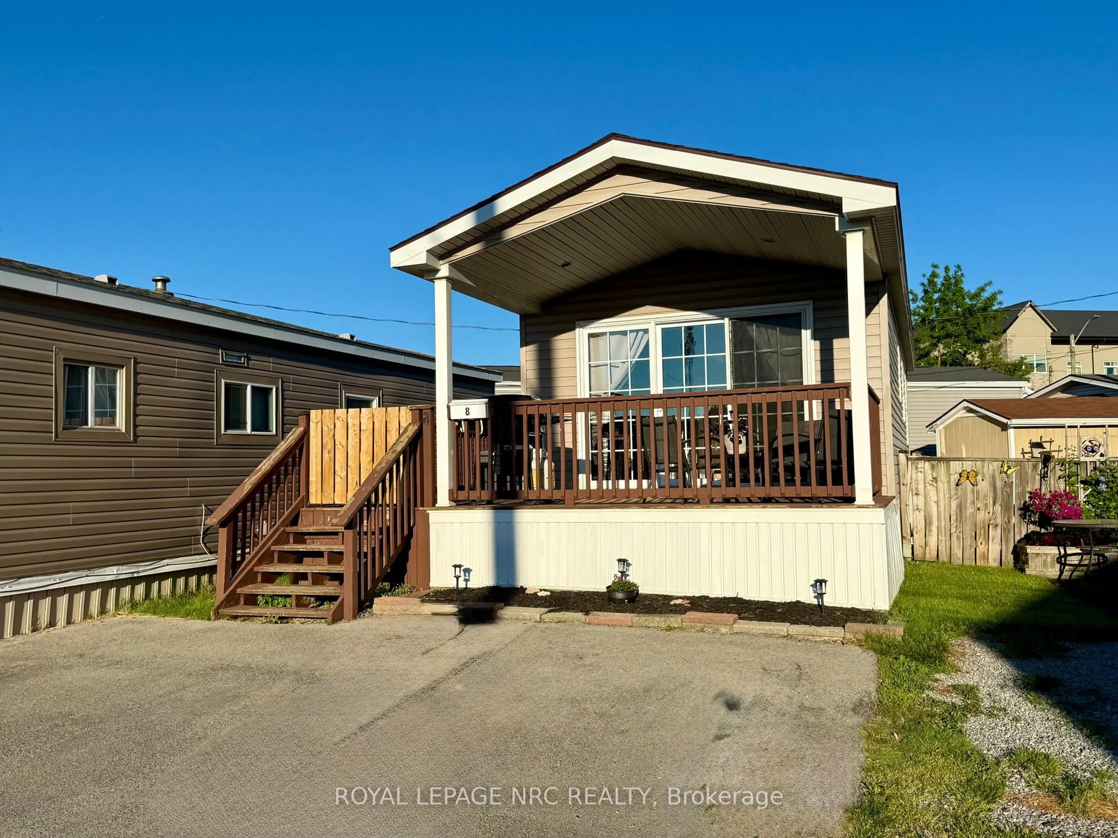 Home with vinyl exterior material, street for 241 st. paul St #8, St. Catharines Ontario L2S 2E5
