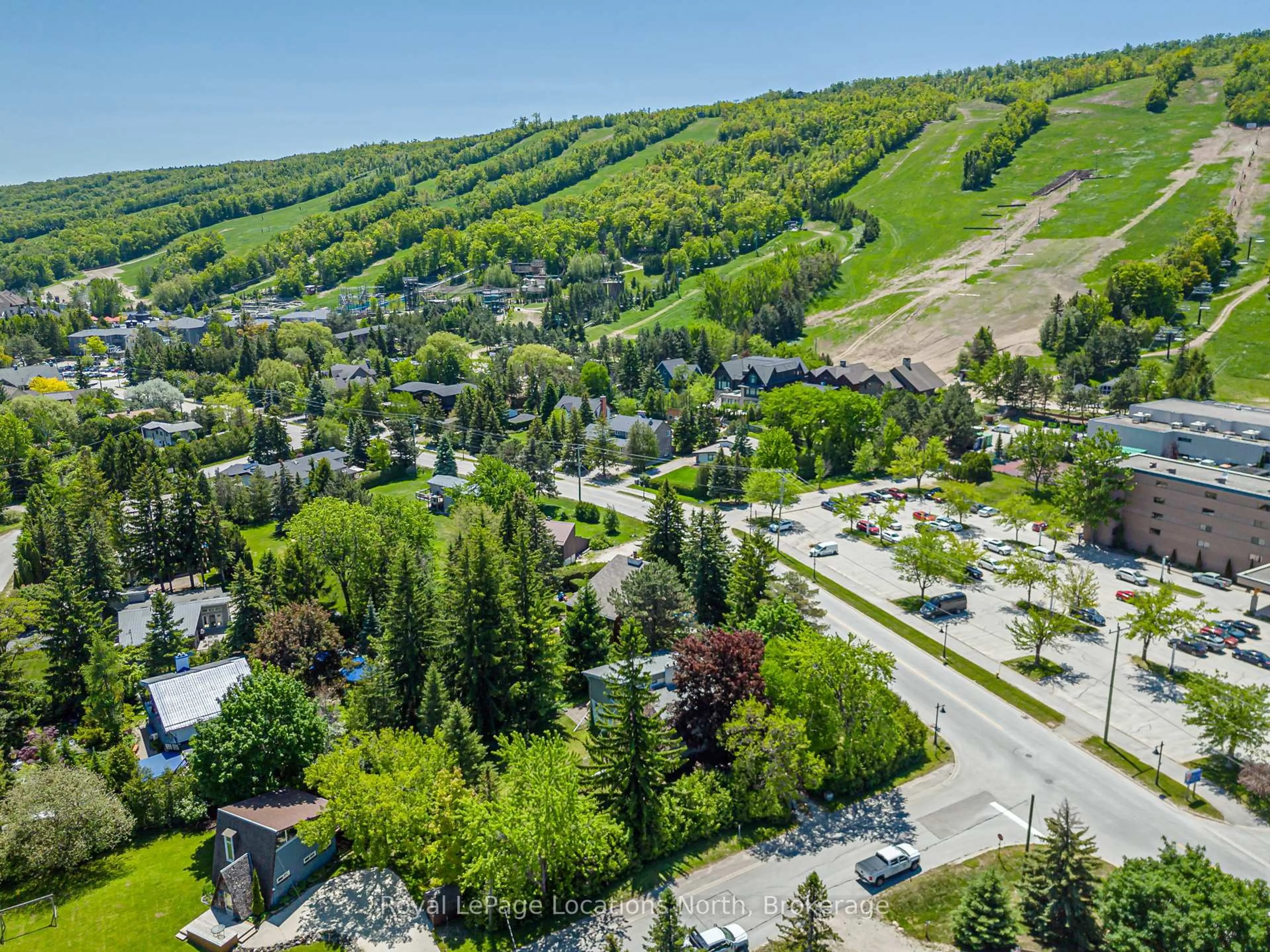 A pic from outside/outdoor area/front of a property/back of a property/a pic from drone, mountain view for 102 Lucille Wheeler Lane, Blue Mountains Ontario L9Y 0P4