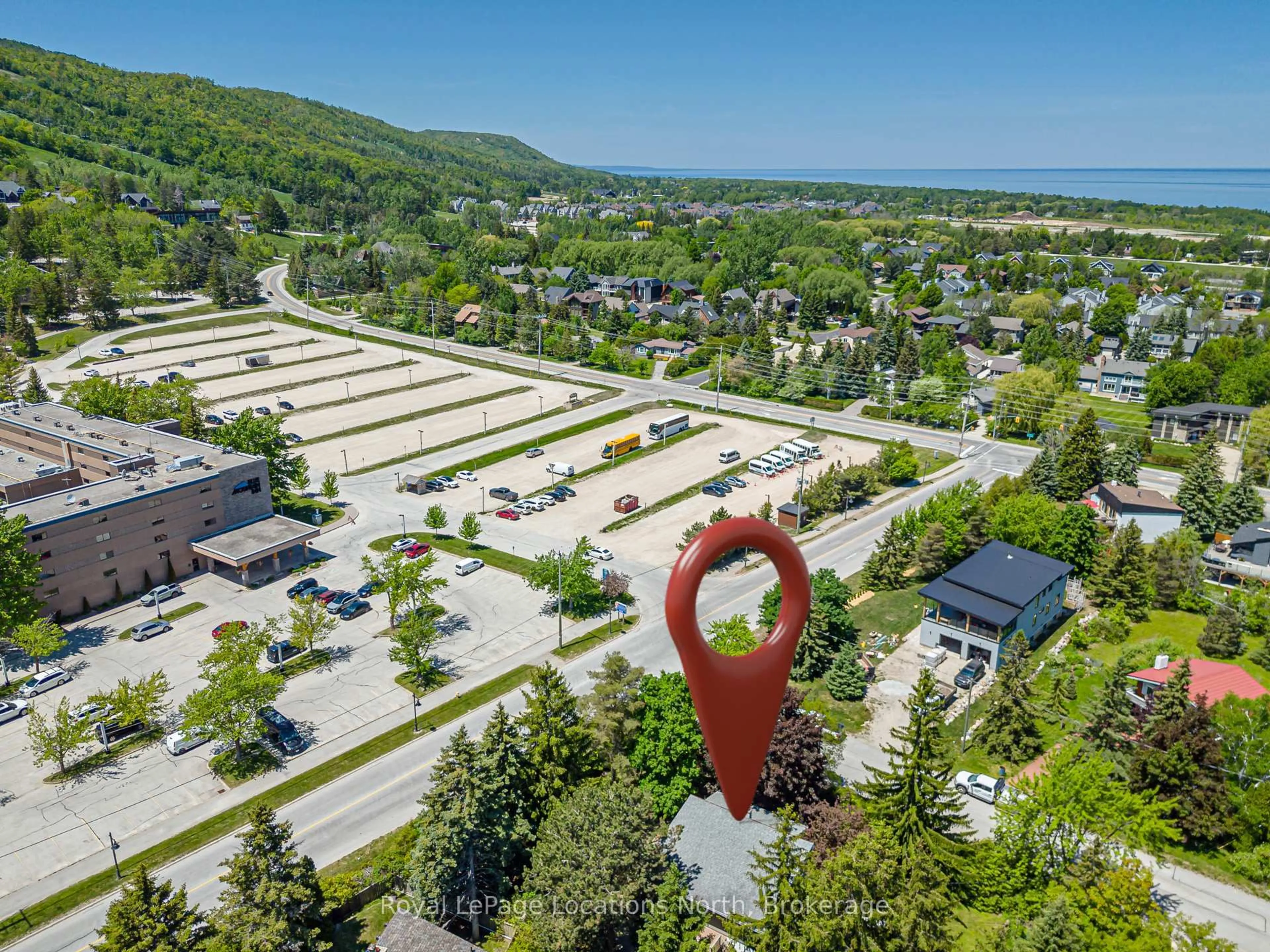 A pic from outside/outdoor area/front of a property/back of a property/a pic from drone, mountain view for 102 Lucille Wheeler Lane, Blue Mountains Ontario L9Y 0P4