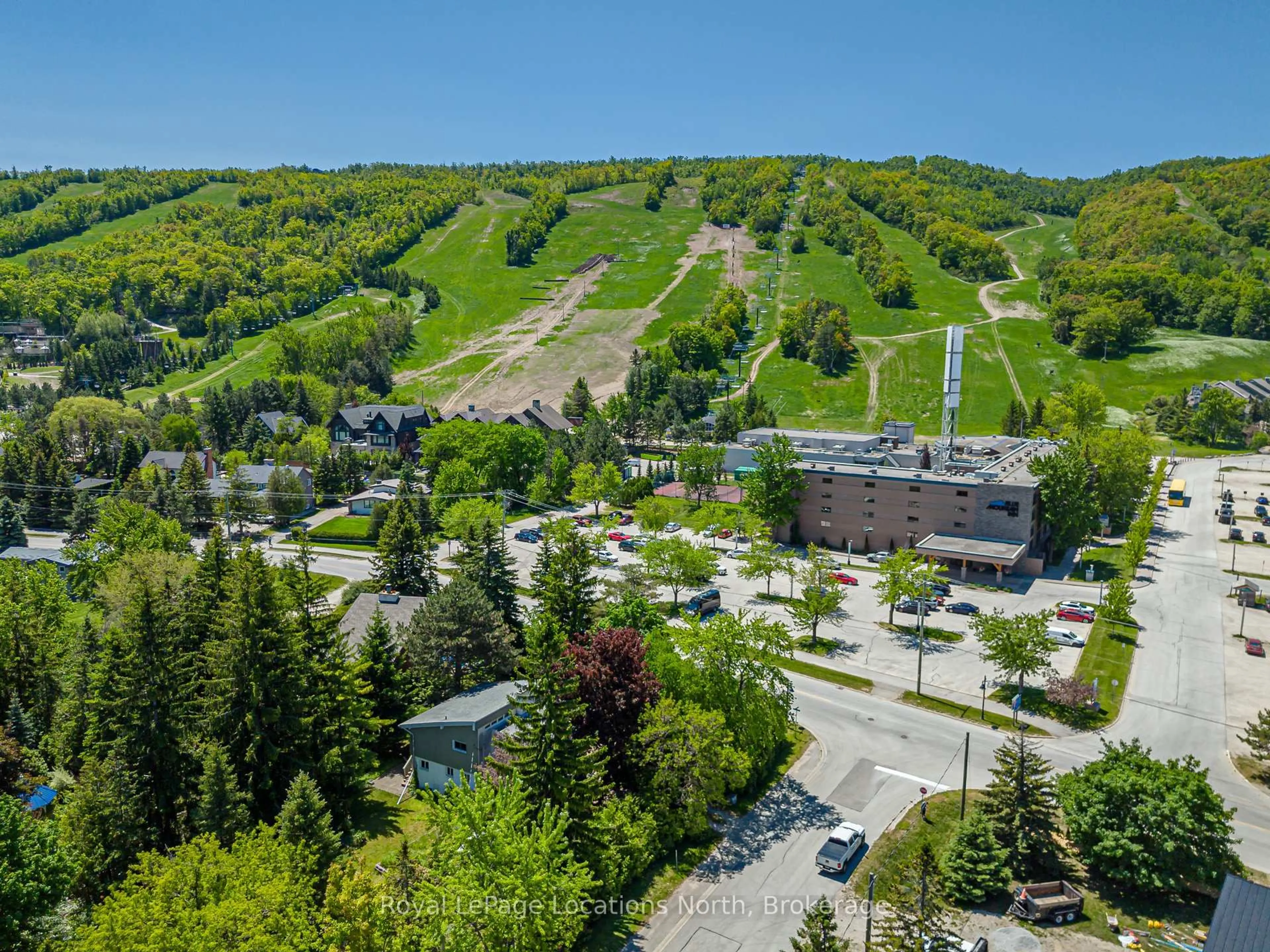 A pic from outside/outdoor area/front of a property/back of a property/a pic from drone, mountain view for 102 Lucille Wheeler Lane, Blue Mountains Ontario L9Y 0P4