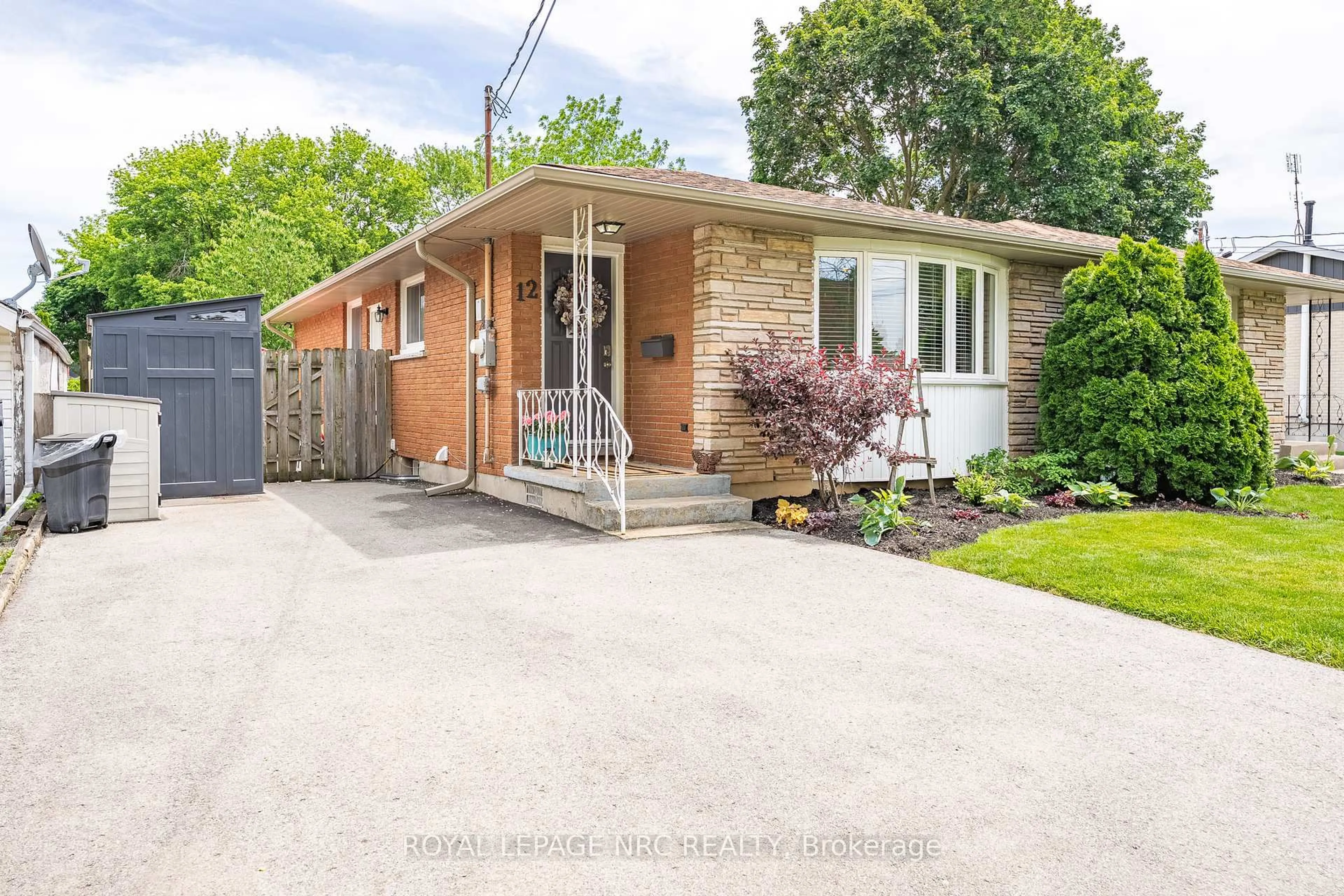 Home with brick exterior material, street for 12 CYPRESS St, St. Catharines Ontario L2N 4L9