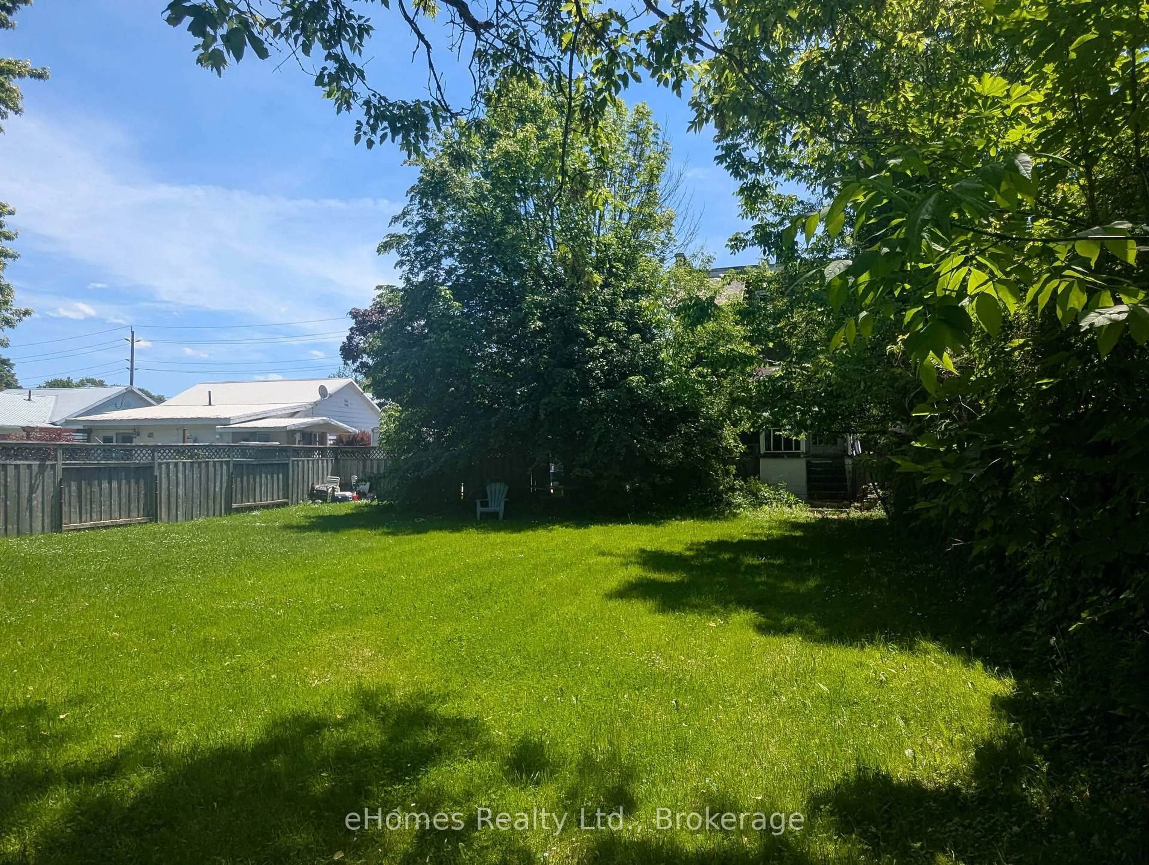 A pic from outside/outdoor area/front of a property/back of a property/a pic from drone, forest/trees view for 470 13th St, Owen Sound Ontario N4K 3W7